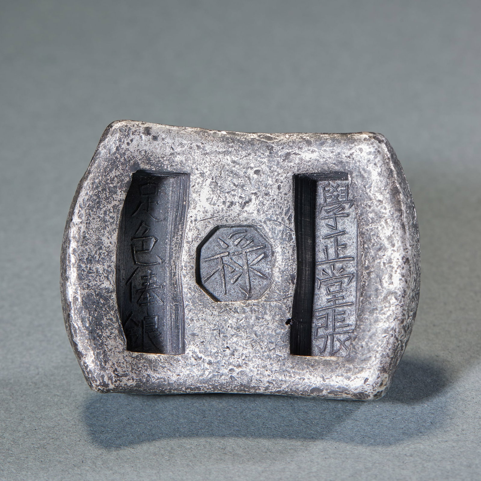 Ten-Taels Silver Ingot with the Character Lu: Lu Character Ten-Taels Silver Ingot, height 2.5cm, length 5.5cm, width 4.5cm, weight 351g. Cast by local silver furnaces of the Qing Dynasty or the Republic of China period, a "Lu" character auspiciou