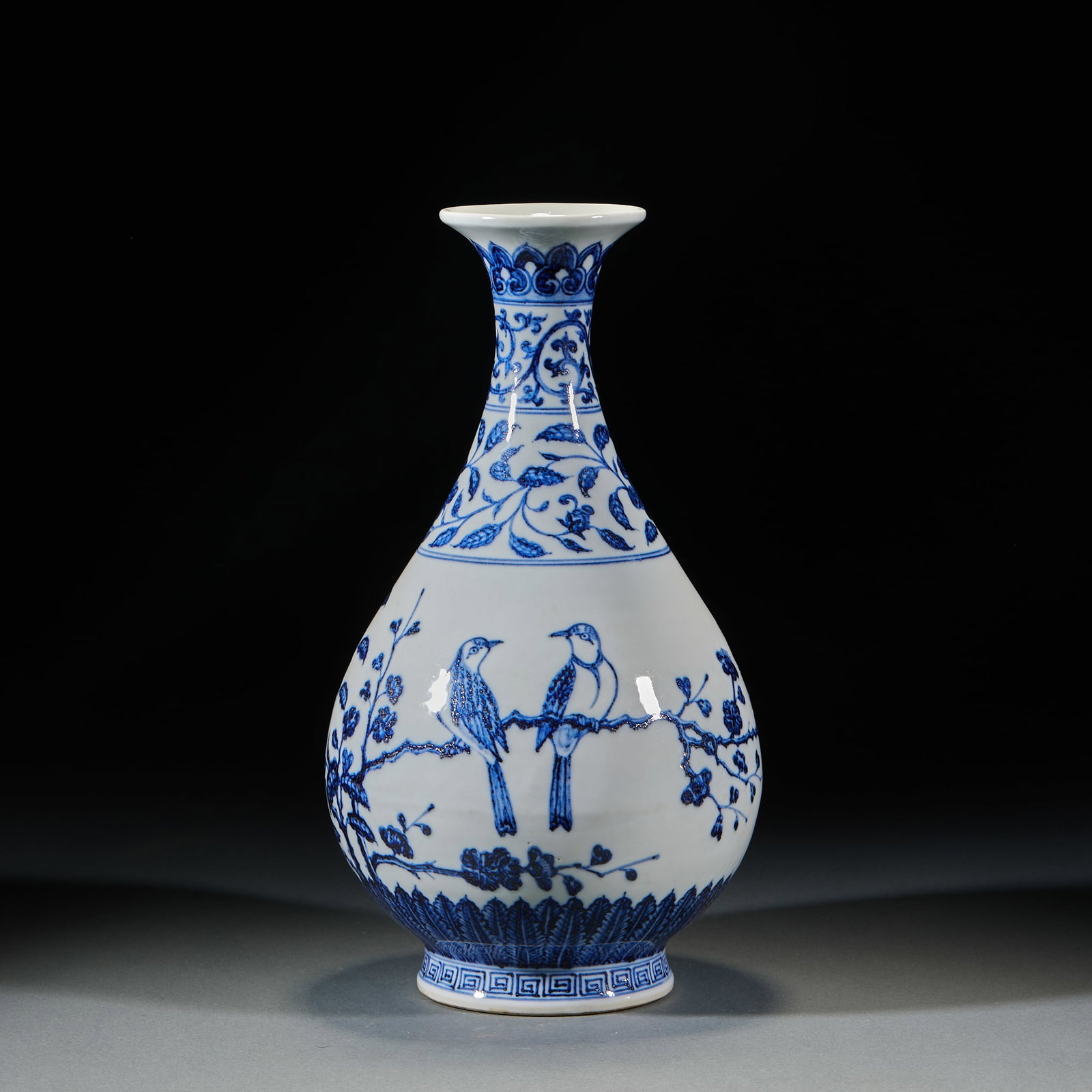 Blue and White Yuhuchun Vase with Magpie on Plum Blossom Motif: Blue and White "Magpies on Plum Blossoms" Yuhuchun Vase, Height 32.5cm, Diameter 16.5cm. A classic shape from Ming-Qing Jingdezhen imperial kilns, "Magpies on Plum Blossoms" as a traditional