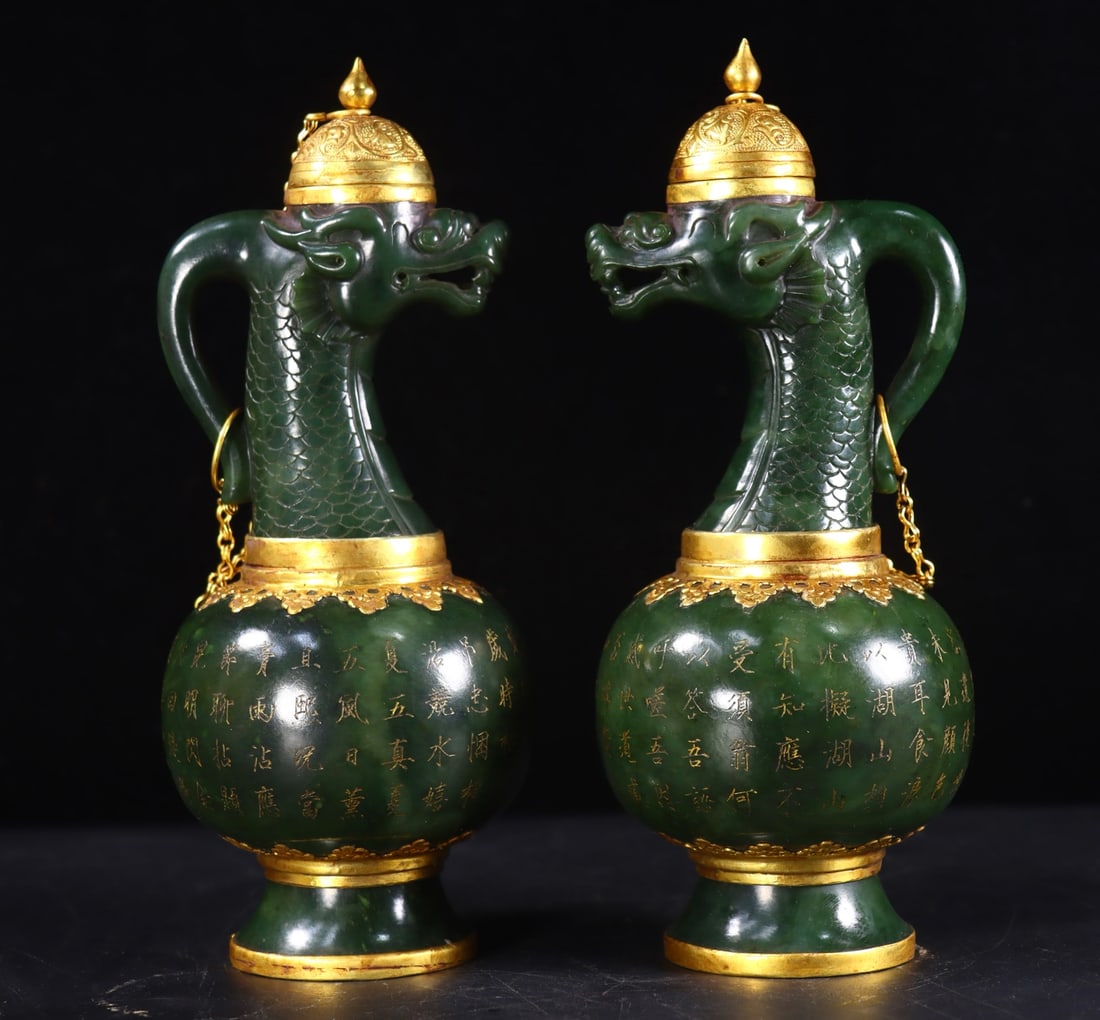 A Pair of Hetian Jasper Dragon-Head Inscribed Teapots with Gold Mounting & Inlay: Pair of Hotan Green Jade Gold-Mounted Dragon-Head Inscribed Ewers, Height 21.5cm, Length 8.5cm, Width 8cm, Weight 820g, Qing Dynasty Imperial Workshop (Imperial Wine Vessels, Handed Down, Matched Pair