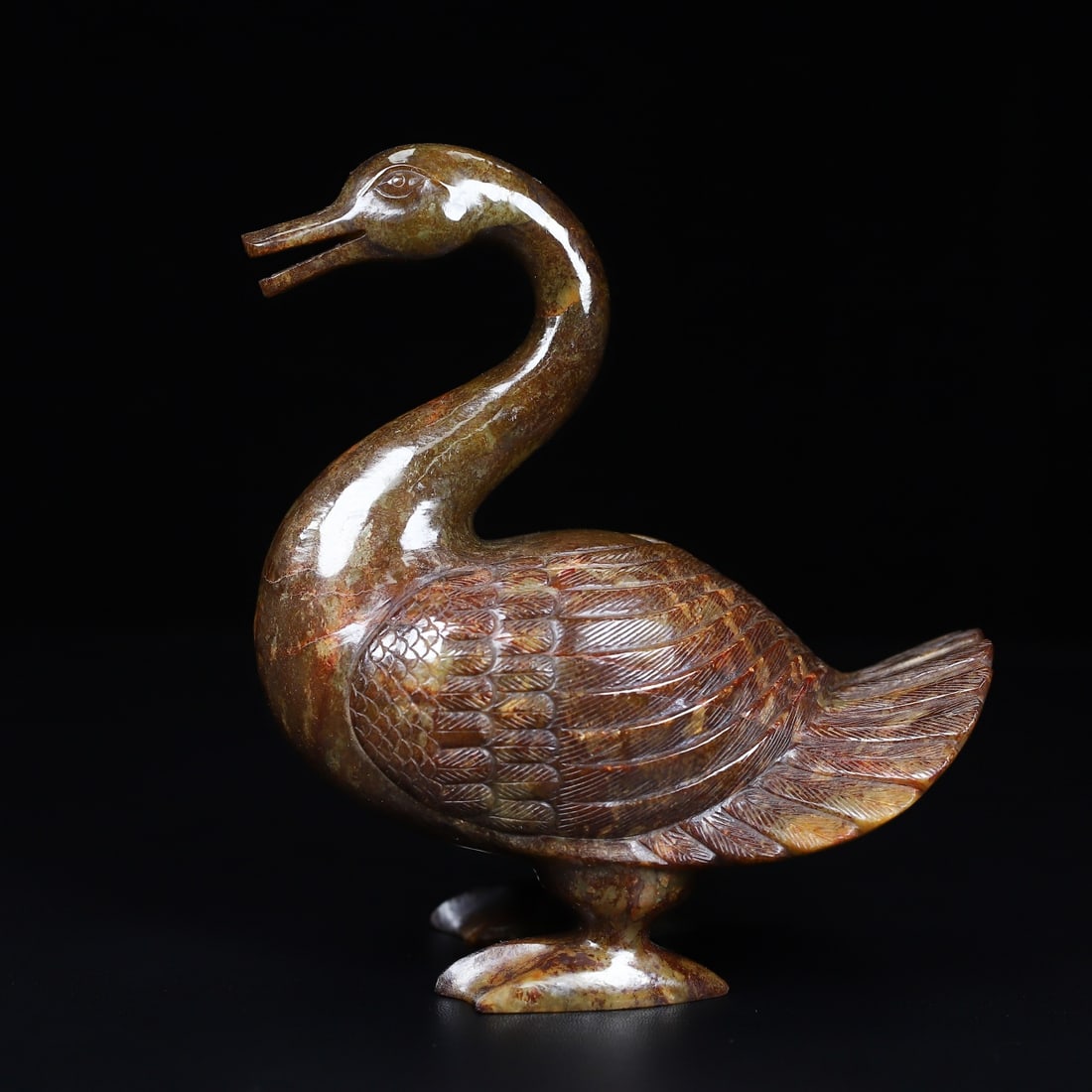 Hetian Jade Goose: Warring States?Han Period Hetian Jade Goose. Height 13.5cm, Width 12.5cm, Thickness 6.8cm, 664g. Warring States?Han Period (Archaic Furnishing / Ritual Object, Excavated / Heritage Piece). Material: N