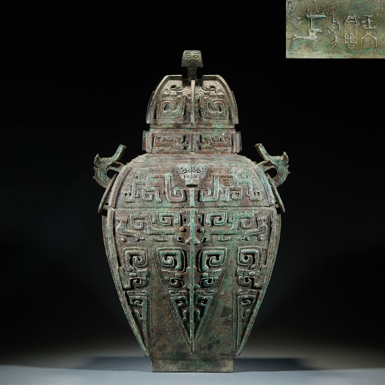 Bronze Square Lei Vessel with Beast Mask Pattern, Shang Dynasty: Shang Dynasty Bronze Square Lei with Animal Mask Decoration, H.72cm L.36cm W.30cm. Shang-Zhou bronze ritual vessel, unearthed or handed down; bronze body; cast in high relief with full-body taotie