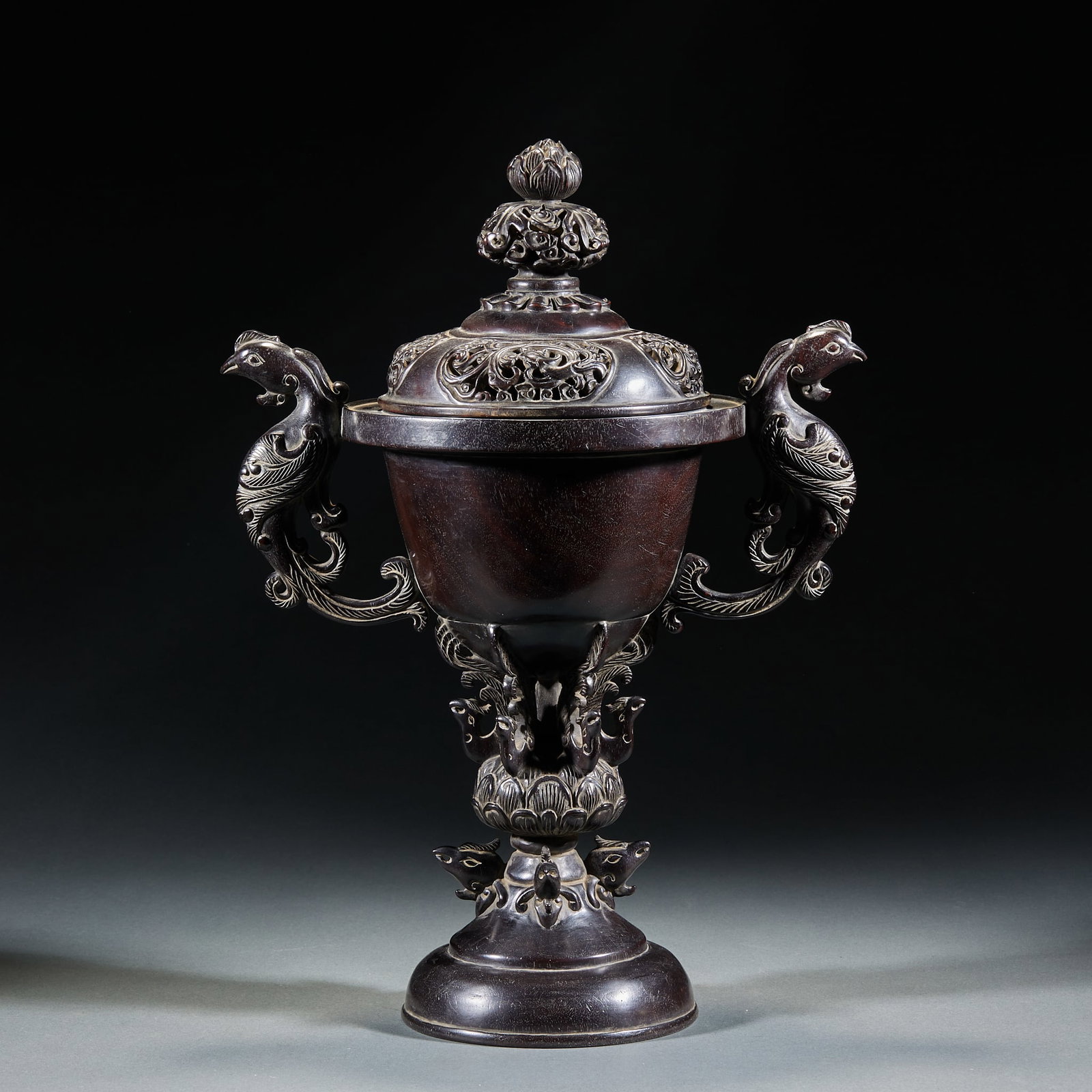 Qing Dynasty Rosewood Censer with Double Phoenix Ears and High Foot: Zitan Wood Incense Burner with Double Phoenix Ears and High Foot, Qing Dynasty, H.39cm L.27cm W.18cm. Imperial or scholar's incense vessel, handed down with base; natural small-leaf red sandalwood;