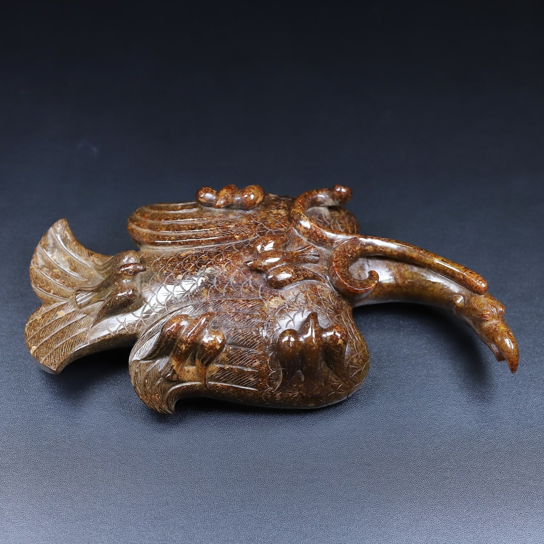 Hetian Jade Bird: One Hotan jade bird carving, L. 23.6cm, H. 8.2cm, W. 7.6cm, 1286g, Warring States–Han Dynasties (ancient jade ornament/decoration, excavated/hereditary); natural Hotan jade (sugar white jade, fine a