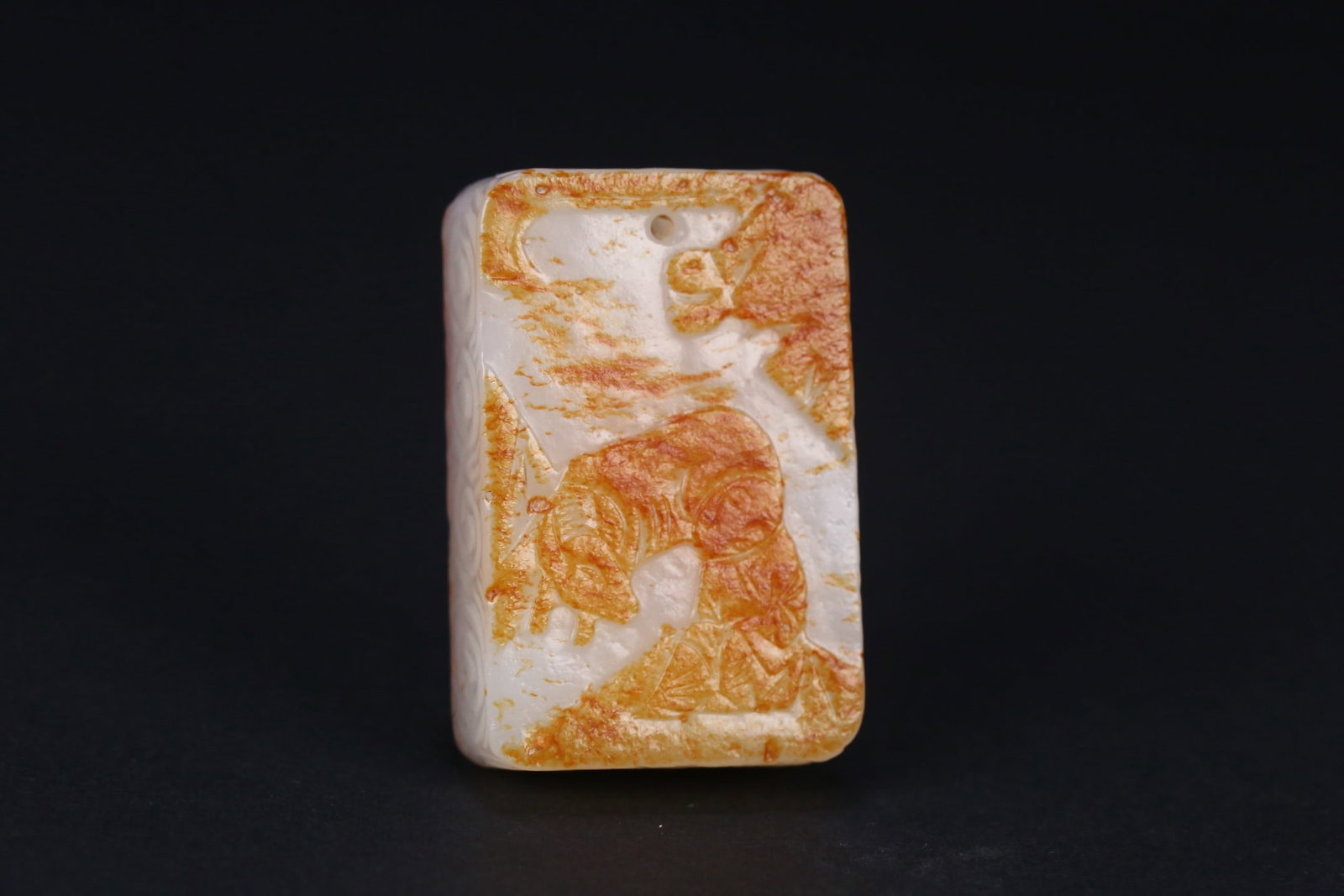 Hetian Jade Seed Material Plaque of Boy Herding Ox: One Hotan jade seed material plaque of Boy Herding Ox, L. 4.6cm, W. 3cm, 44.6g, Qing Dynasty/Modern period (Hotan jade ornament, hereditary); natural Hotan jade seed material (white jade with red