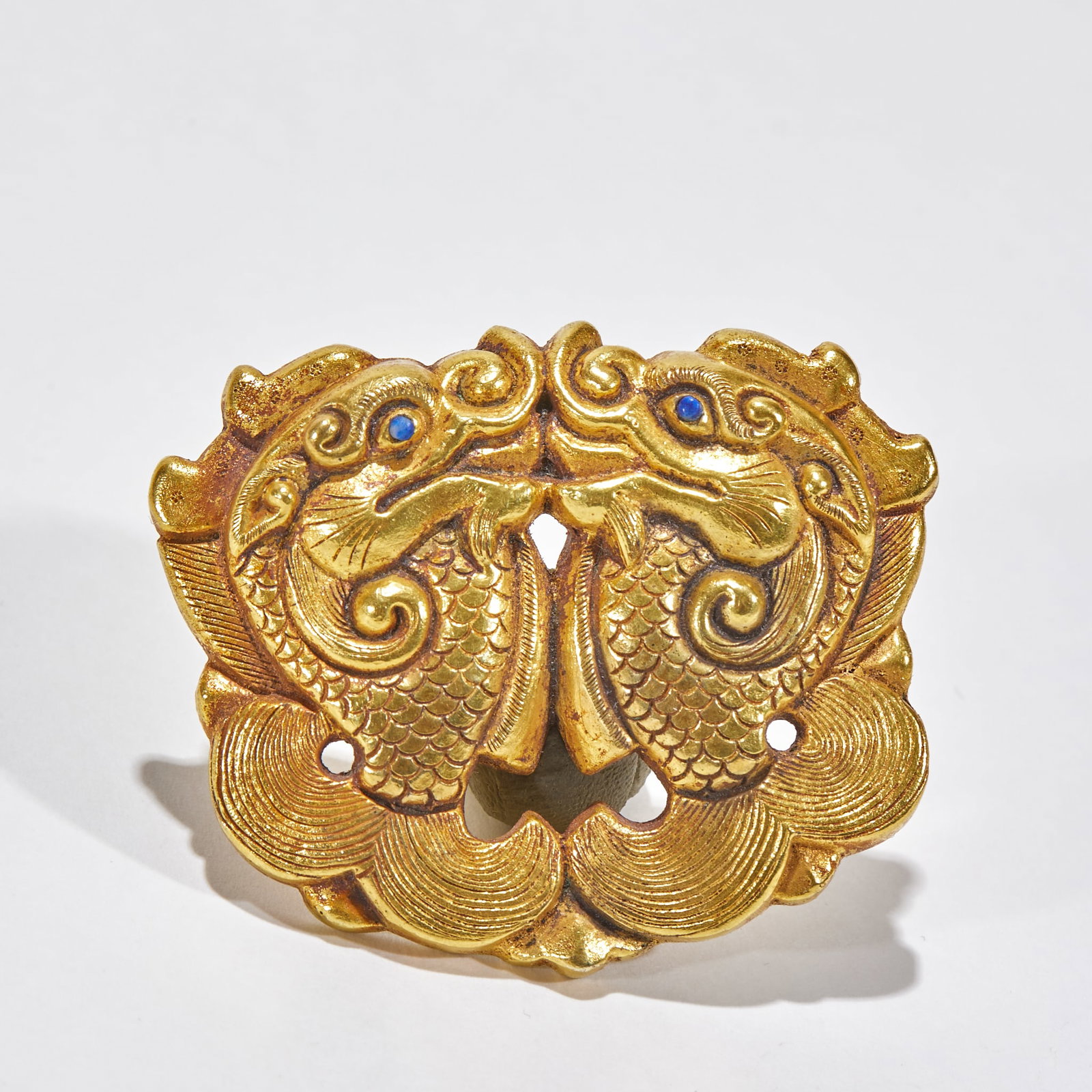 Gilt Silver Accessory of 'Fish Transforming into Dragon': Gilt-Silver Fish-Dragon Pendant, L 5.2cm, W 4.3cm, 50g. Ancient period (Tang-Song / Liao-Jin dynasties, 618–1234), gilt-silver pendant, hereditary antique. Silver body with full gilt finish and