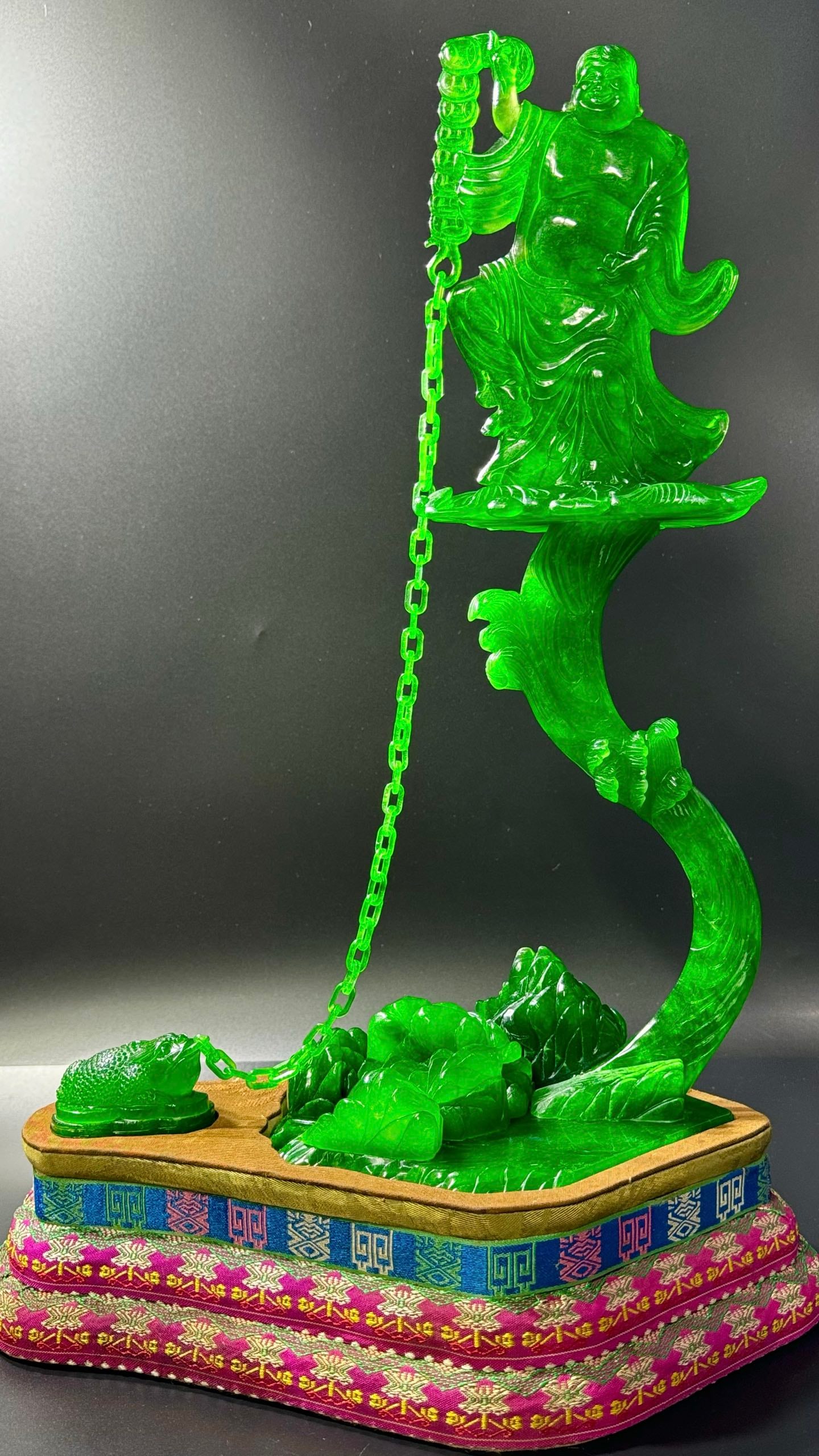 Translucent Emerald Ornament: Liu Hai Teasing the Golden Toad: Translucent Emerald Ornament: Liu Hai Teasing the Golden ToadH 50 cm, W 30 cm