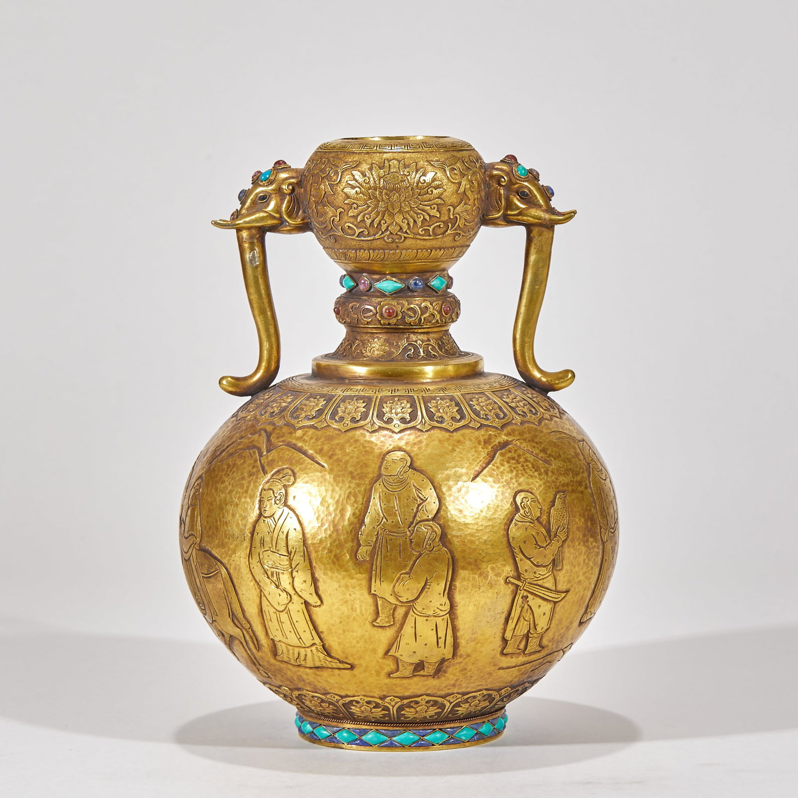 PreMing Gilt Bronze ElephantEar Vessel Inlaid with Gemstones, Carved with Narrative Figure Scenes: PreMing Gilt Bronze ElephantEar Vessel Inlaid with Gemstones, Carved with Narrative Figure ScenesH 26 cm, Belly Diam. 18 cm
