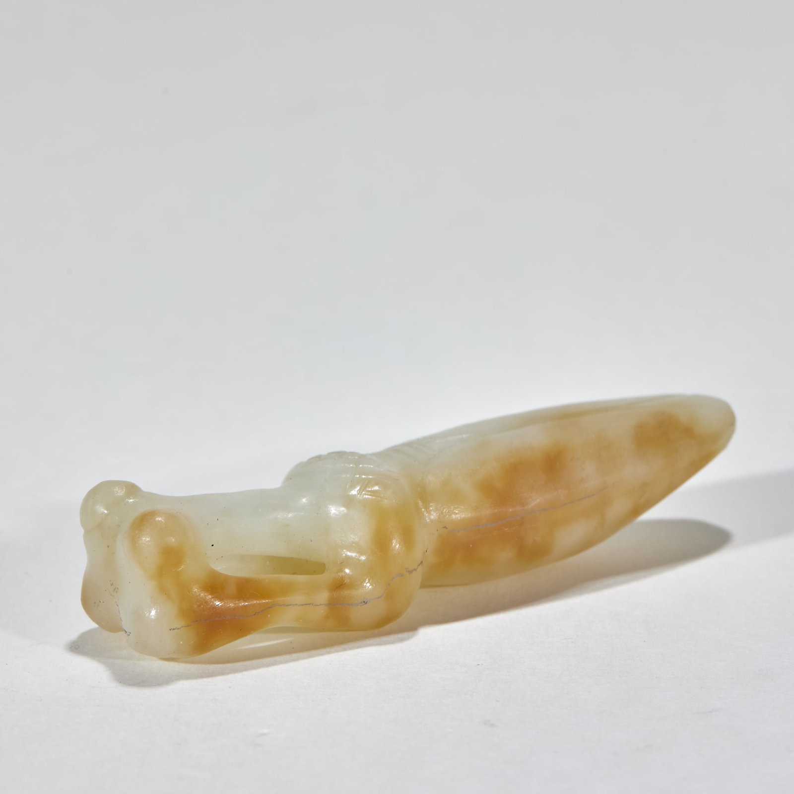 Hongshan Culture Jade Mantis: Hongshan Culture Jade MantisH 1.5 cm, L 7.6 cm, W 2.1 cm