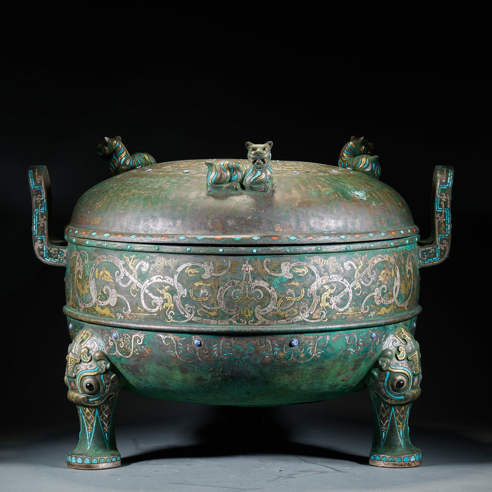 Warring StatesHan Bronze Tripod Ding Vessel with Tiger Knob, Gold & Silver Inlay and Turquoise: Warring StatesHan Bronze Tripod Ding Vessel with Tiger Knob, Gold & Silver Inlay and Turquoise EmbellishmentsH 50 cm, Diam. 67 cm