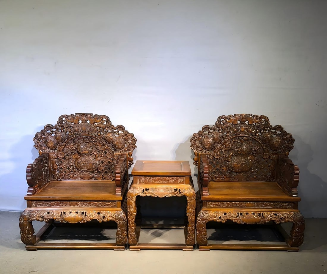 HighRelief Huanghuali Wood GourdShaped Chair: HighRelief Huanghuali Wood GourdShaped ChairBackrest: H 113 cm, L 82 cm, W 58 cm; Tea Table: 50 cm × 50 cm × 72 cm
