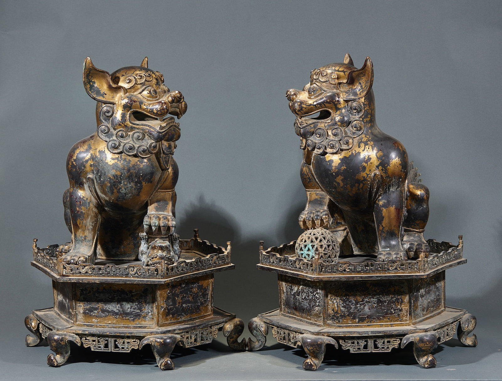 Pair of Qing Gilt Bronze Lion Statues: Pair of Qing Gilt Bronze Lion StatuesH 65 cm, L 46 cm, W 41 cm