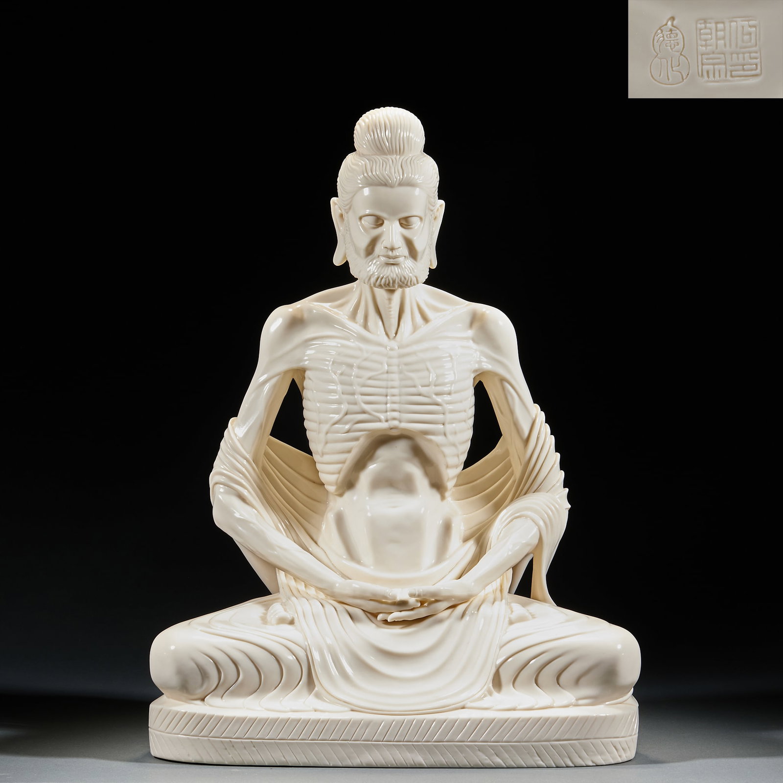 Dehua Kiln Ascetic Shakyamuni Statue, Signed He Chaozong: Dehua Kiln Ascetic Shakyamuni Statue, Signed He ChaozongH 49 cm, L 37 cm, W 20 cm