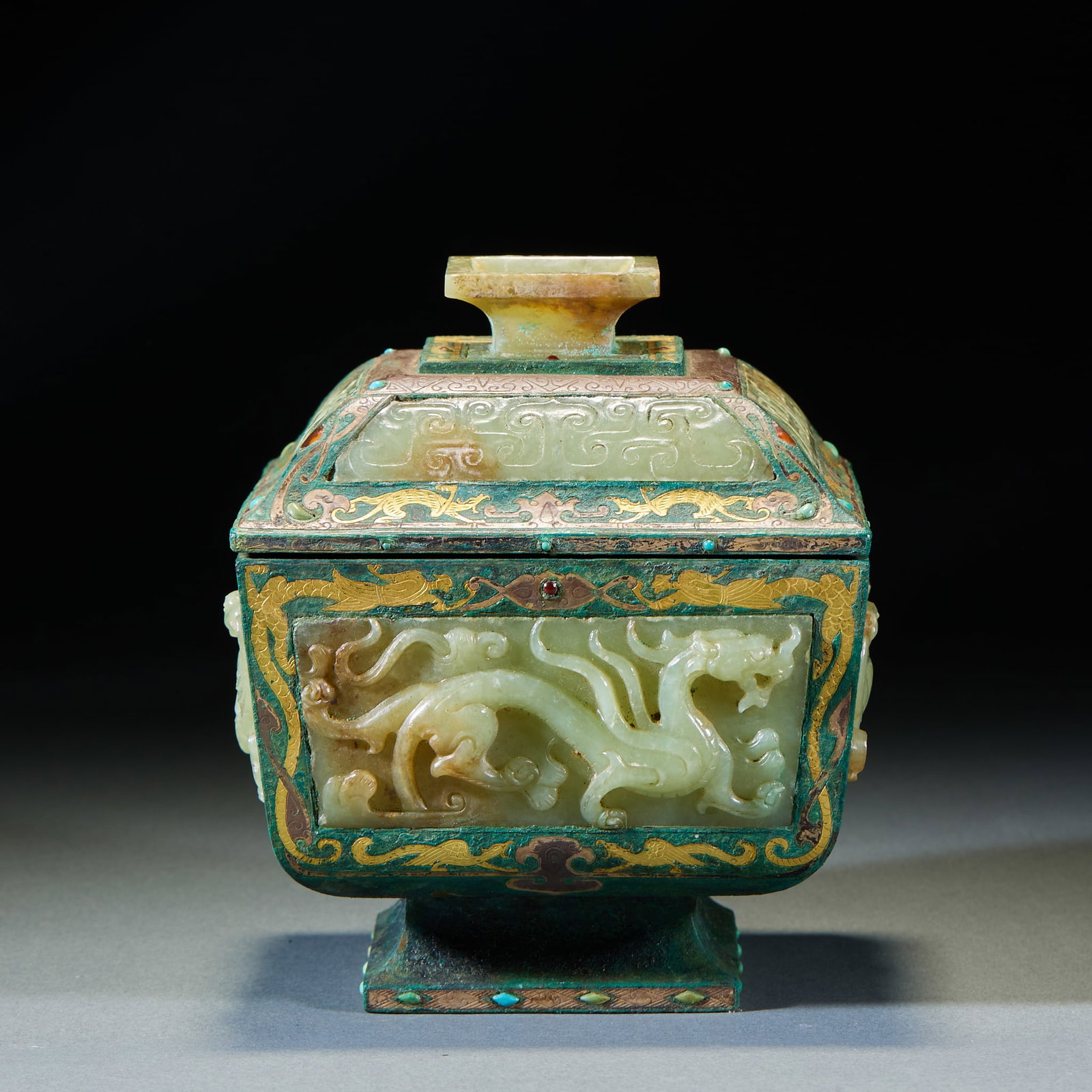 Warring StatesHan Gold & Silver Inlaid Covered Box with Four Divine Beast Motifs Inlaid with Jade: Warring StatesHan Gold & Silver Inlaid Covered Box with Four Divine Beast Motifs Inlaid with JadeH 14 cm, L 11.5 cm, W 11.5 cm