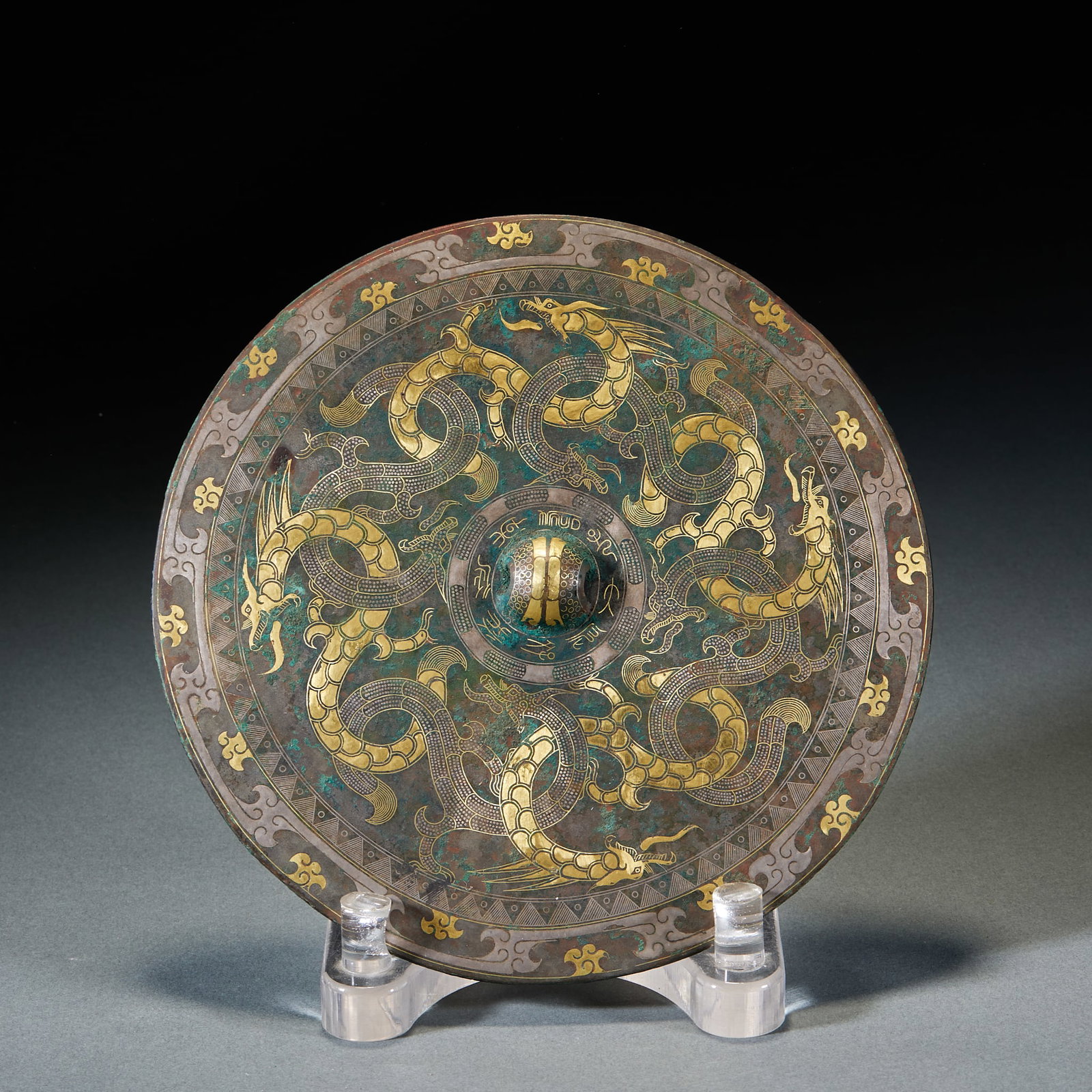 Warring StatesHan Bronze Mirror with Gold & Silver Inlaid Dragon Patterns: Warring StatesHan Bronze Mirror with Gold & Silver Inlaid Dragon PatternsDiam. 19 cm