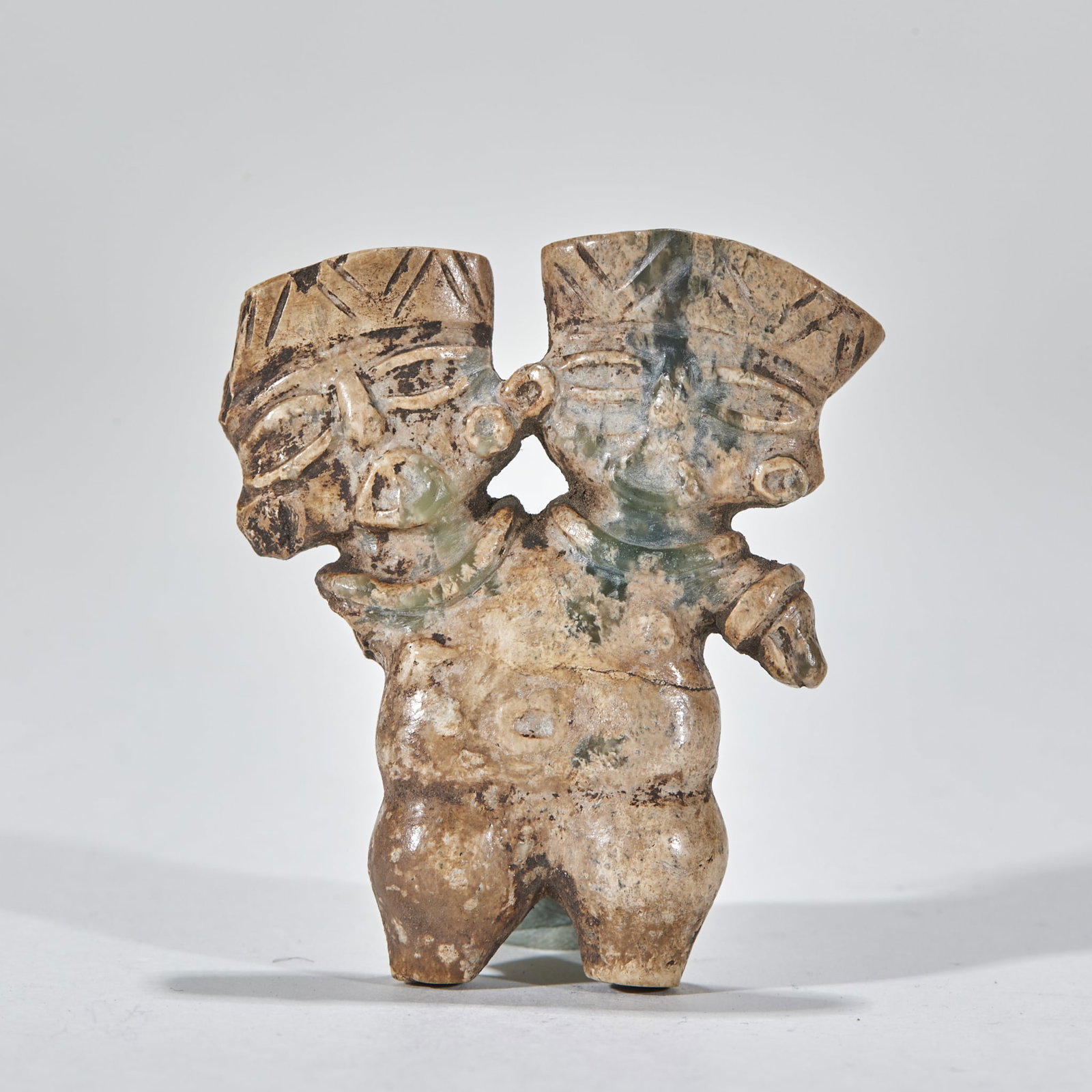Hongshan Culture DoubleHeaded Jade Human Figurine: Hongshan Culture DoubleHeaded Jade Human FigurineThickness 1.2 cm, L 5.6 cm, W 5 cm