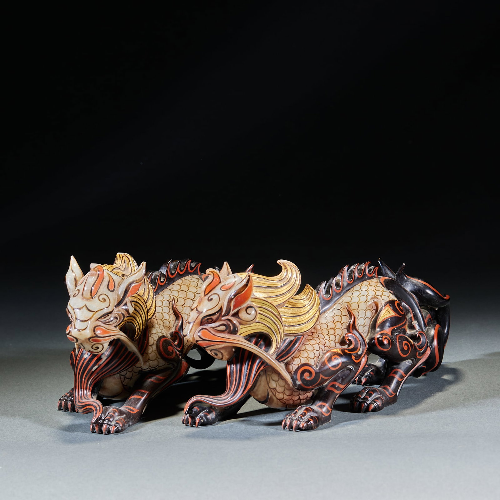 Pair of LiaoJin Painted Jade Auspicious Beasts: Pair of LiaoJin Painted Jade Auspicious BeastsH 8.5 cm, L 20 cm, W 6 cm