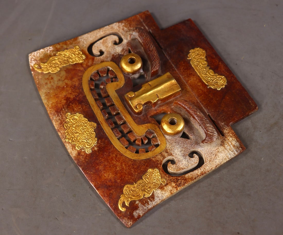 Old Hetian Jade Axe with Taotie Mask Patterns Clad in Gold Mounts: Old Hetian Jade Axe with Taotie Mask Patterns Clad in Gold MountsH 2 cm, L 20.5 cm, W 18 cm