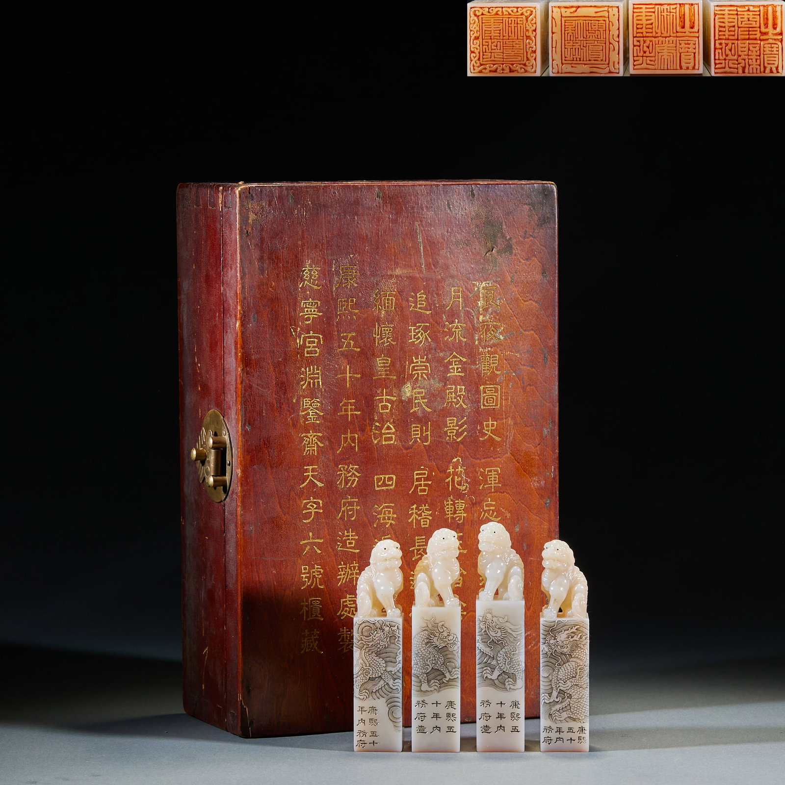 Tian Huangshi beast button seal group of four.: Square seal set, made of white Shoushan stone, each side printed with a carved lion button at the top, a light dragon pattern on the printed body, and an engraving on the printed side. Seal cutting