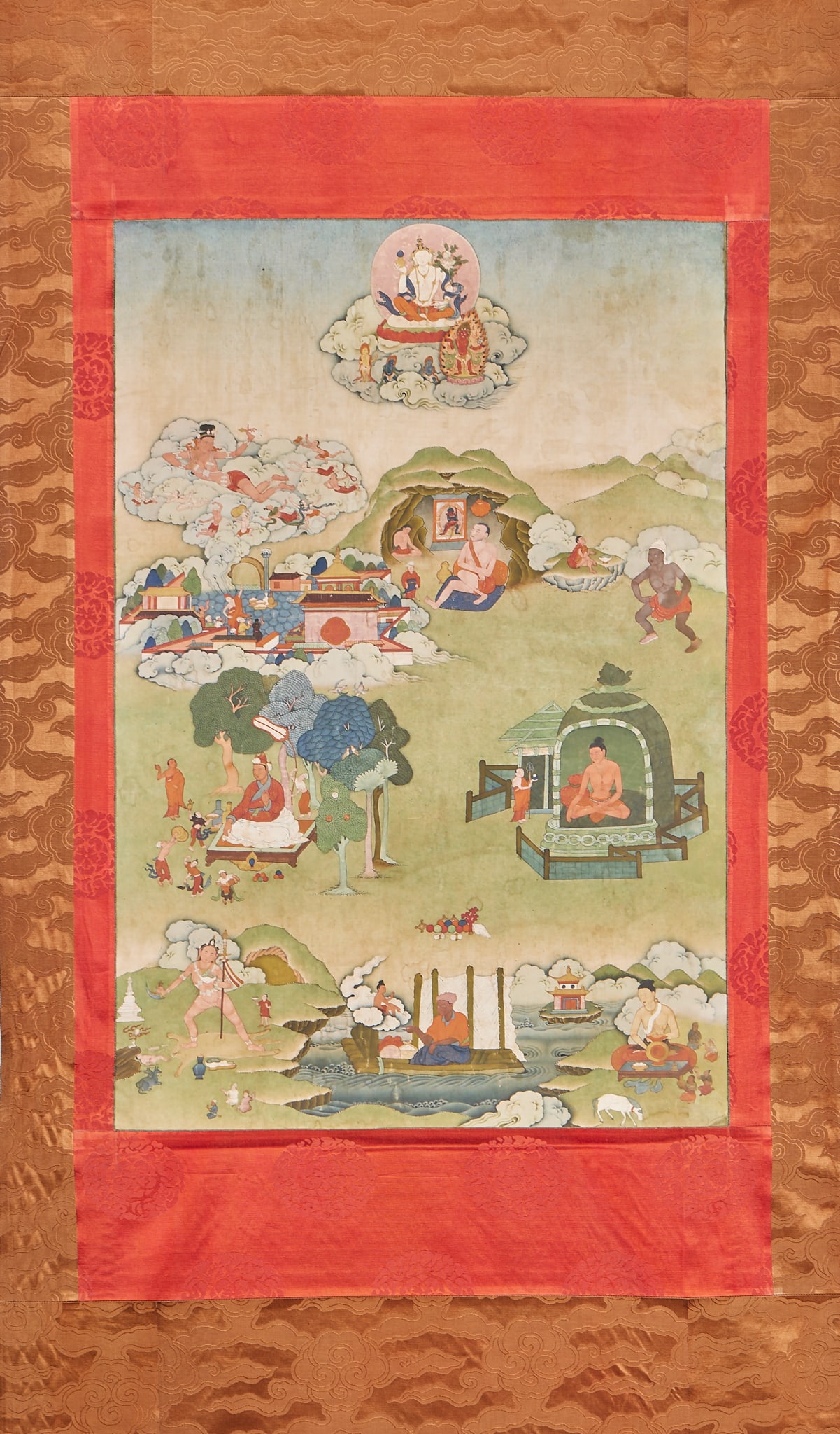 Tibetan Buddhism tantric practice Tangka: Tangka fabric, with red brocade edge on top and bottom, and dark brown brocade on the periphery. At the top of the picture, the master sits on auspicious clouds. The picture is set in the background
