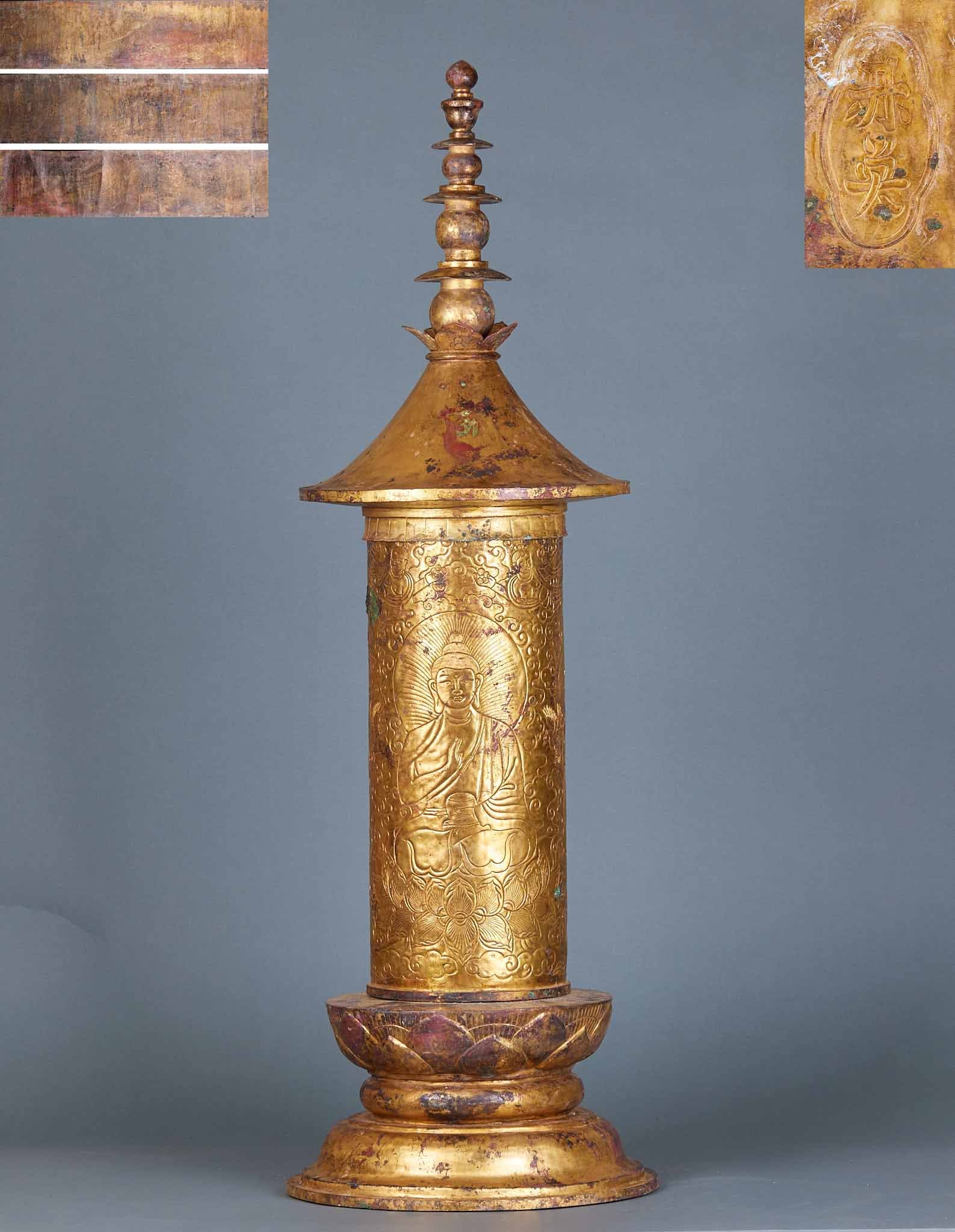 Copper gilt pagoda: The whole structure is made of copper-plated gold, and the base is a double-layer lotus platform, which undertakes the cylindrical building. The outer wall of the building is carved with a sitting Bud