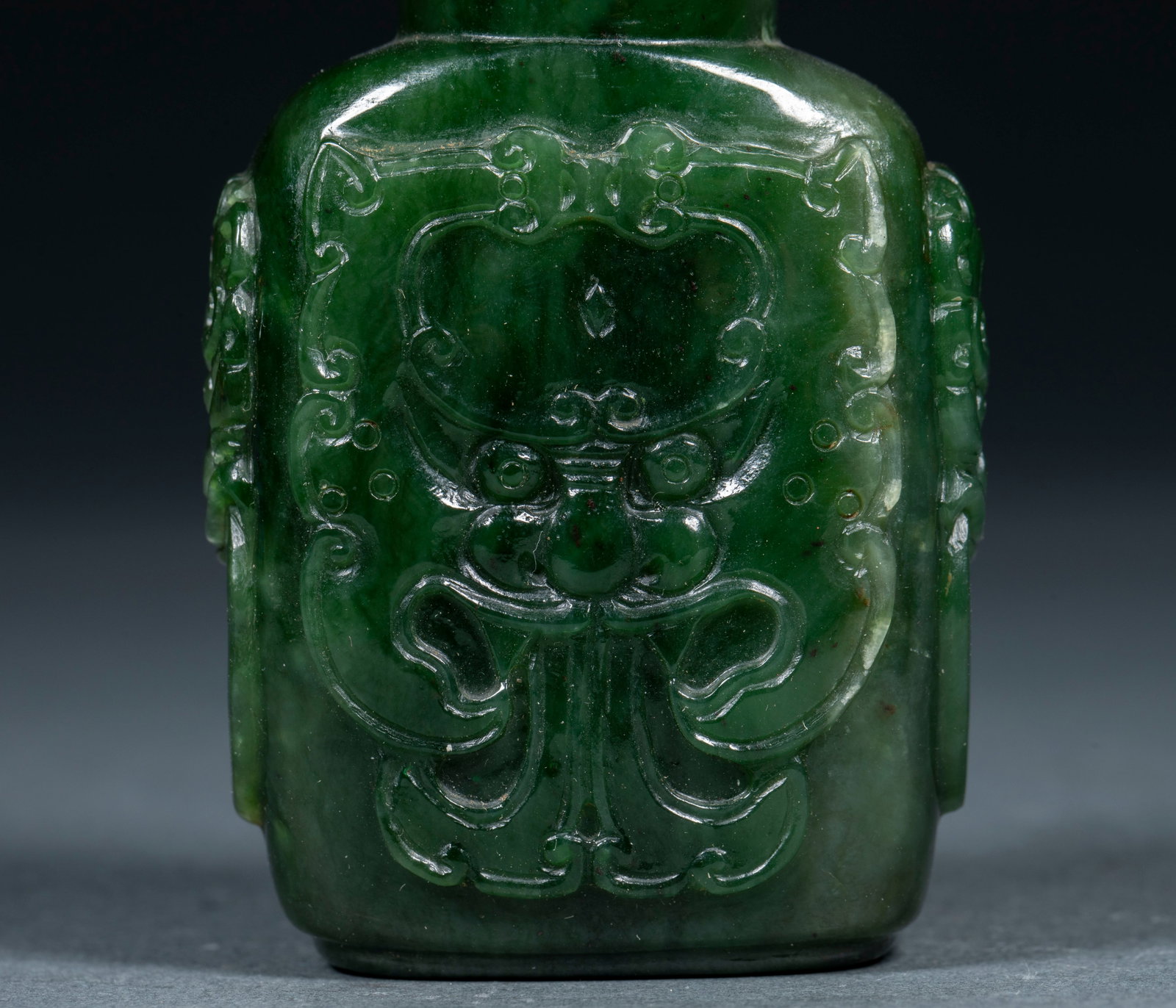 Jade embossed animal face snuff bottle - 2