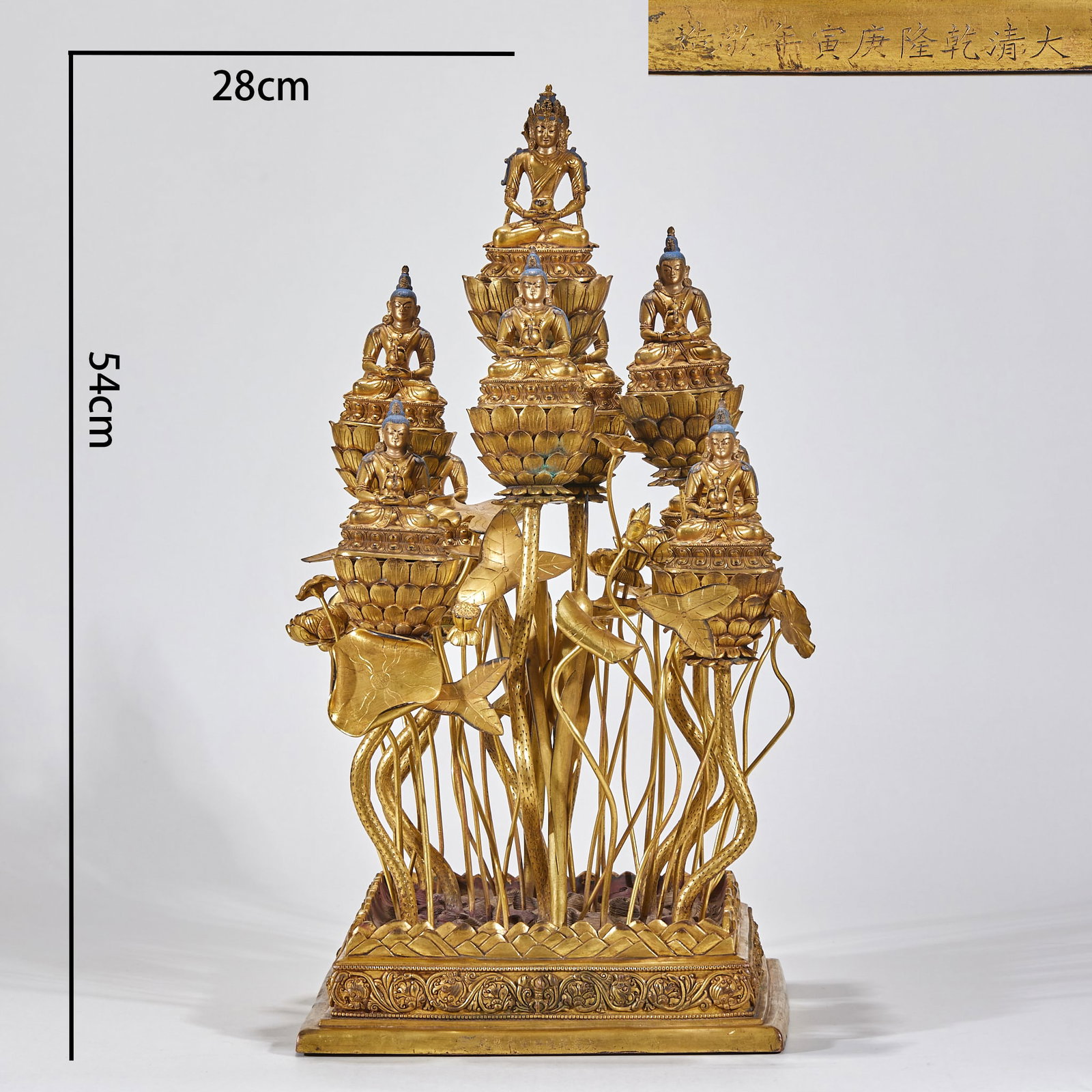 Nine Long-lived Buddhas with Gold-gilded Lotus in Qing Dynasty: Gold-plated copper with a square carved base. There are many gilded lotus stems on the base, each bearing a lotus, and there is a sitting Buddha in the lotus platform, a total of seven Buddha statues,