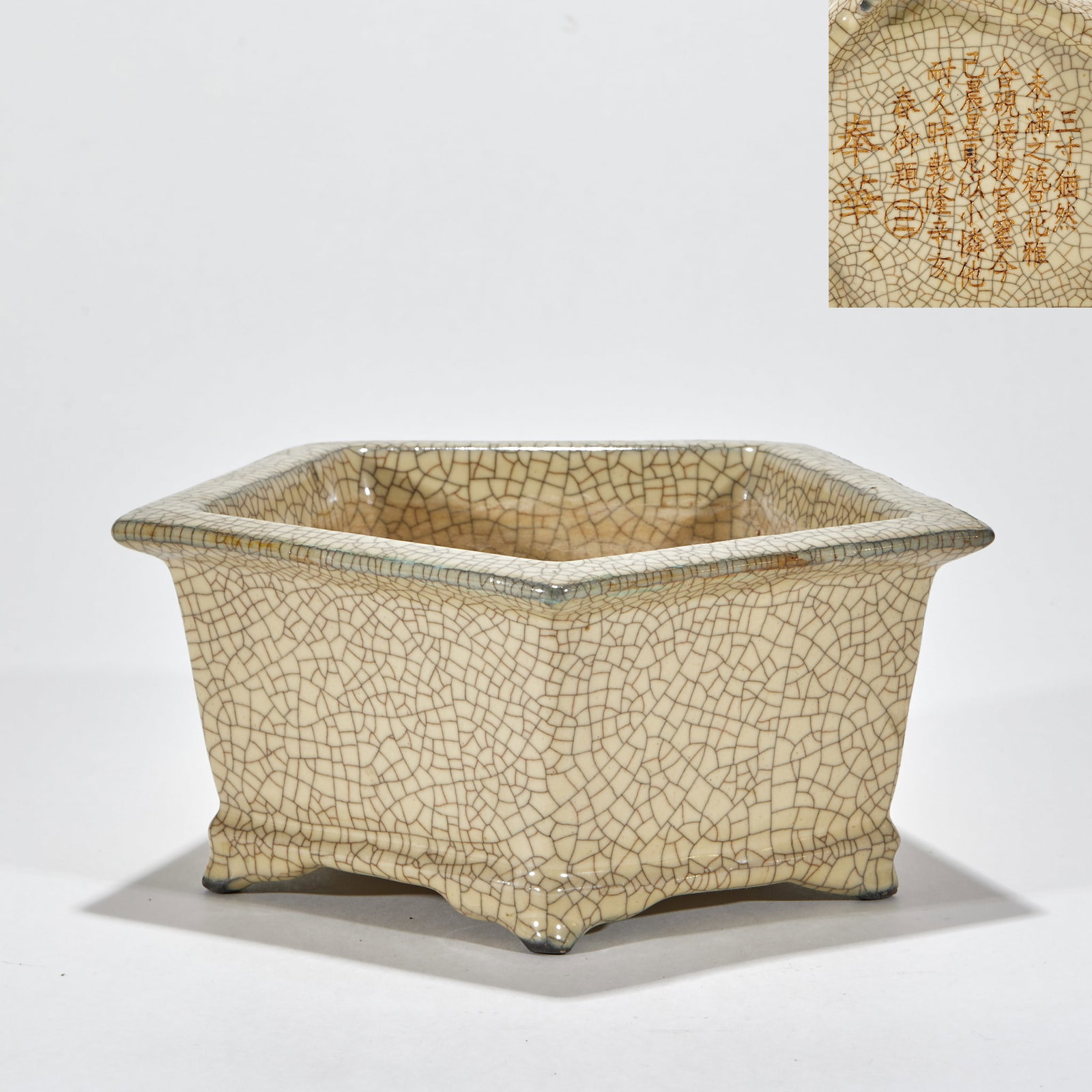 Geyao beige glazed square narcissus basin: Square horn shape, wide open edge, the straight wall of the body converges downward, and four flower-shaped feet appear at the bottom. The beige glaze is covered with gold and iron wires. The bottom