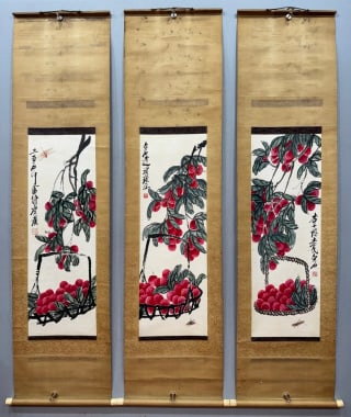 Qi Baishi's three screens of good luck: Three complete sets of vertical shafts, mounted in old silk. Litchi is painted in each picture, the fruit is red and full, the branches and leaves are dark and vigorous, the basket is filled with