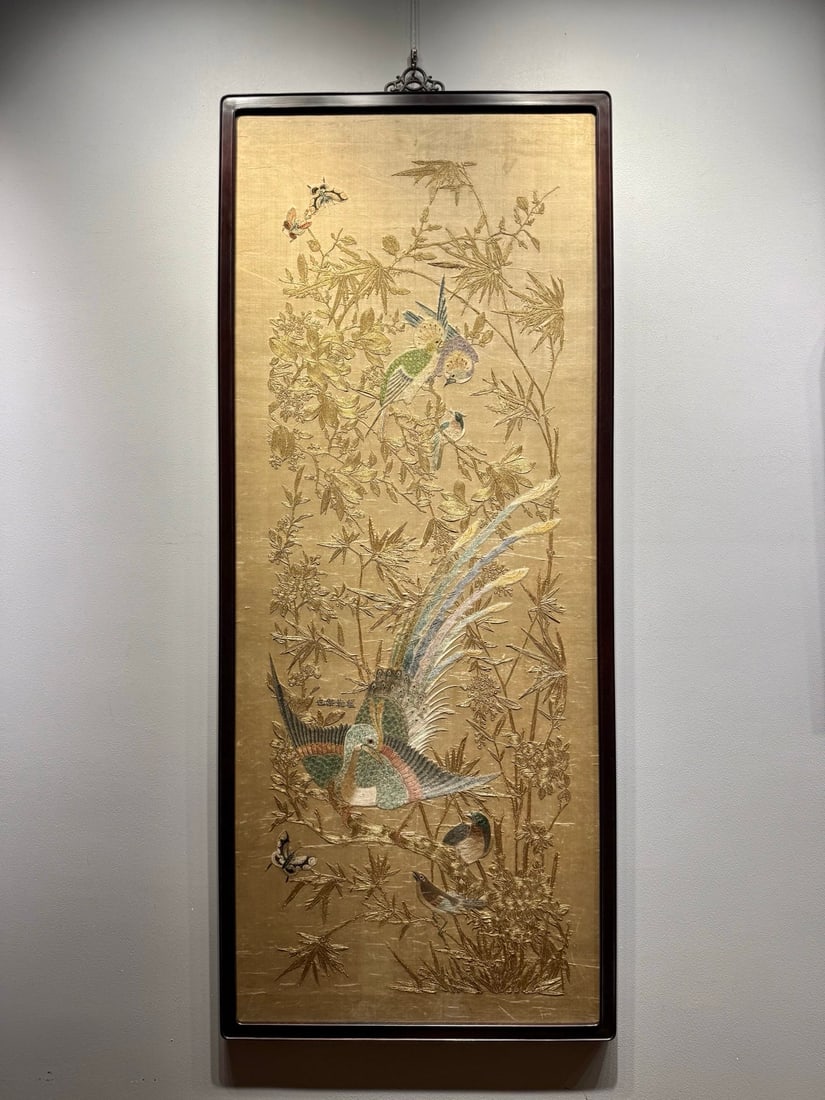 Agate immortal riding crane for aromatherapy: The main body is a white jade phoenix bird, which spreads its wings with its head held high. The neck and body of the phoenix bird are covered with gold and copper. The jade boy statue is placed on th