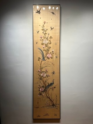 Guangdong embroidery in the late Qing Dynasty and the Republic of China is icing on the cake.: Rectangular vertical screen, wooden frame mounting. Light yellow ground, the main body draws upward-growing flower branches, the branches bloom with various flowers, and many birds and butterflies