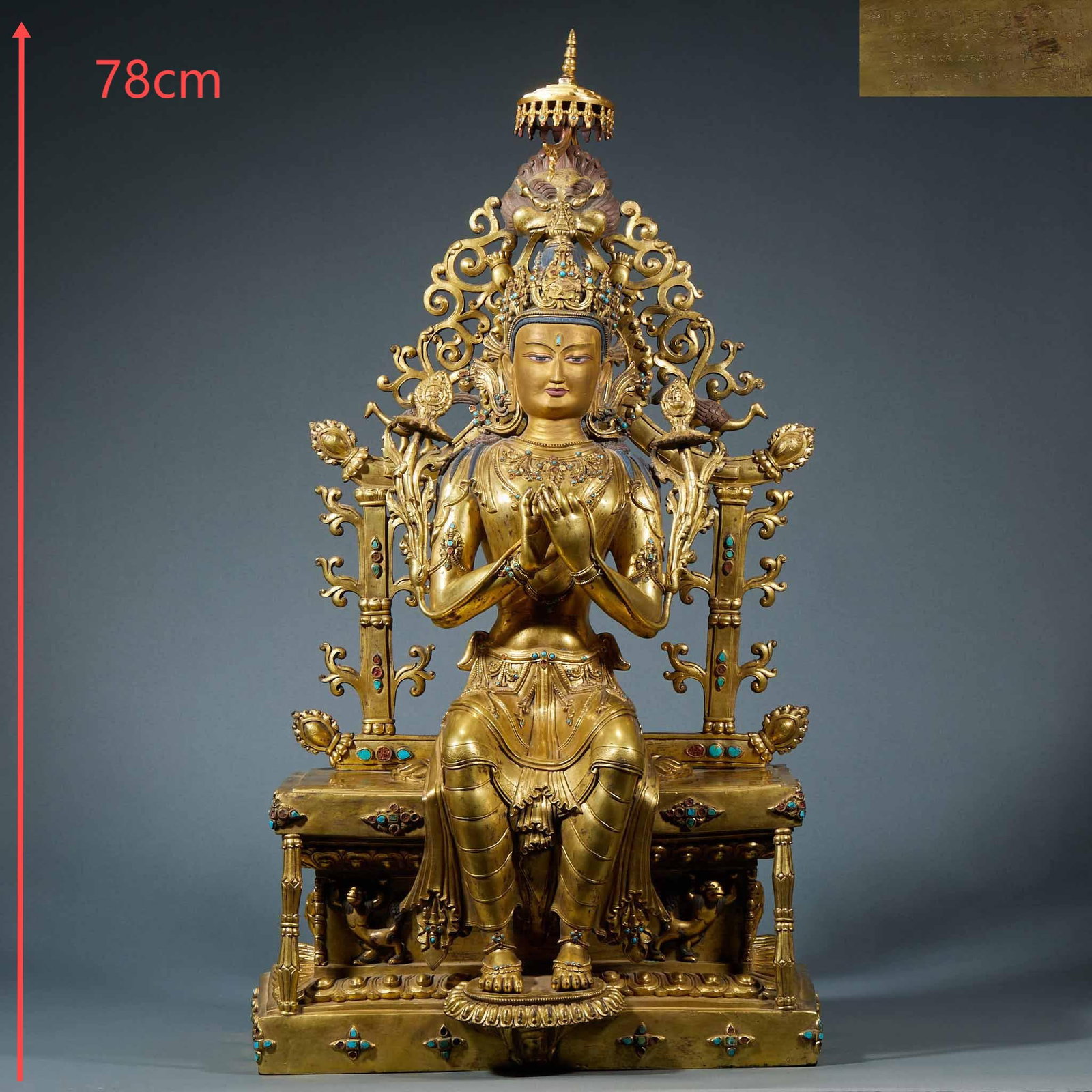Bronze gilded Tara Statue: Bronze gilded statue, 78 cm high. Bodhisattva sits on the throne of sumeru, with her hands tied on her chest. Wearing a crown, wreaths and armbands, and inlaid with turquoise and red treasure. There