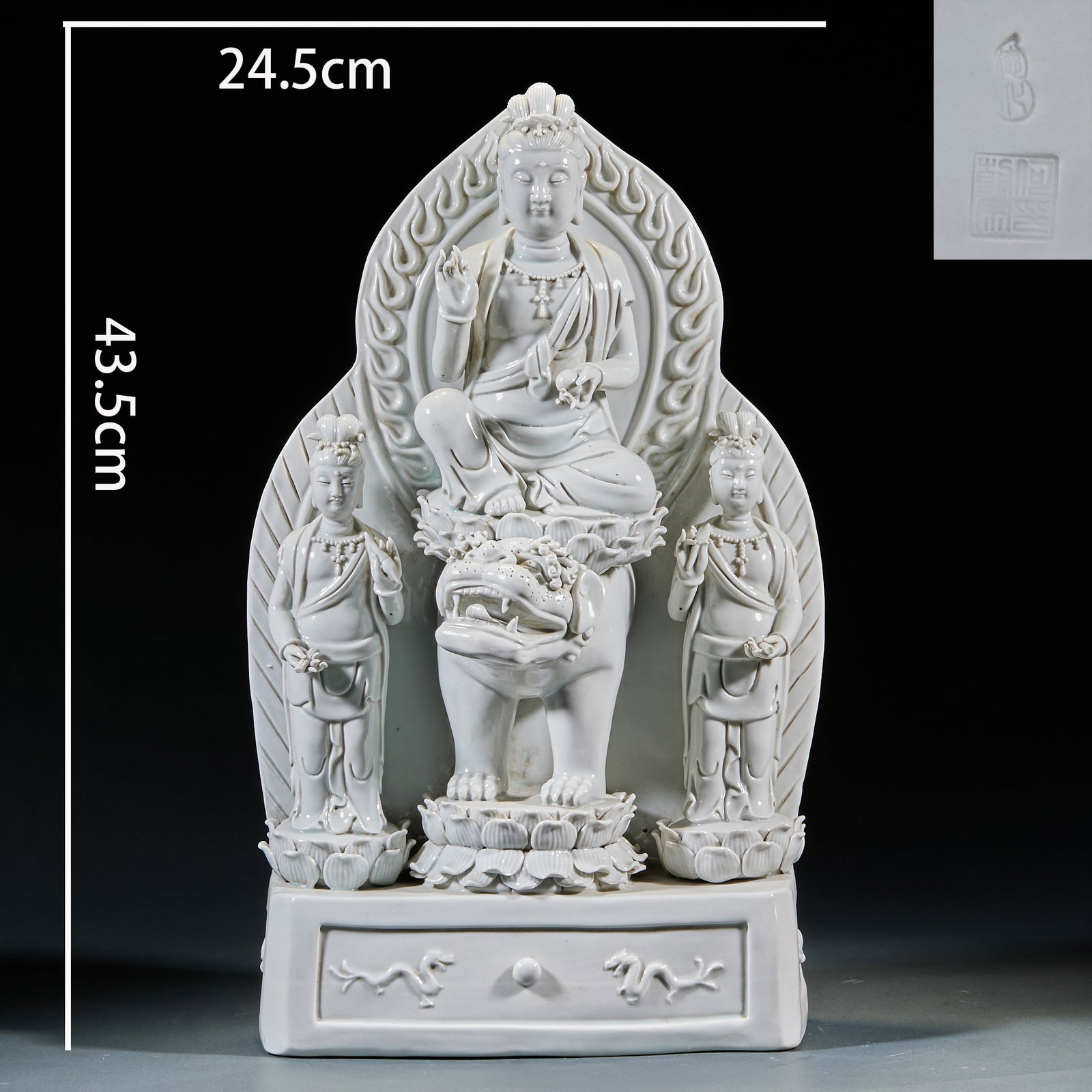 He Chaozong manjusri bodhisattva statue in Dehua kiln white porcelain in Ming Dynasty: Dehua white porcelain Manjusri Bodhisattva statue is 43.5cm high and 24.5cm wide. Manjusri Bodhisattva sits on the lotus platform on the back of the green lion, with a flame pattern backlight behind t