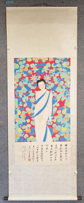Zhang Daqian Lady with Flower Border: Paper, colour, hanging scroll in original old mounting. The image shows a standing Guanyin in light robes with a blue sash against a ground densely painted in red with scrolling floral ?? vivid and