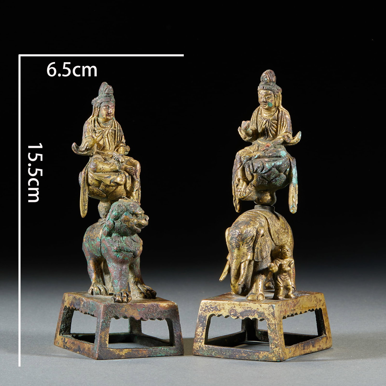 Pair of Gilt Copper Manjusri and Samantabhadra Images: Total H 15.5 cm, base W 6.5 cm. Of gilded copper: Manjusri rides a lion, Samantabhadra an elephant; the bodhisattvas sit in lotus position with fluidly carved robes. They stand on openwork square