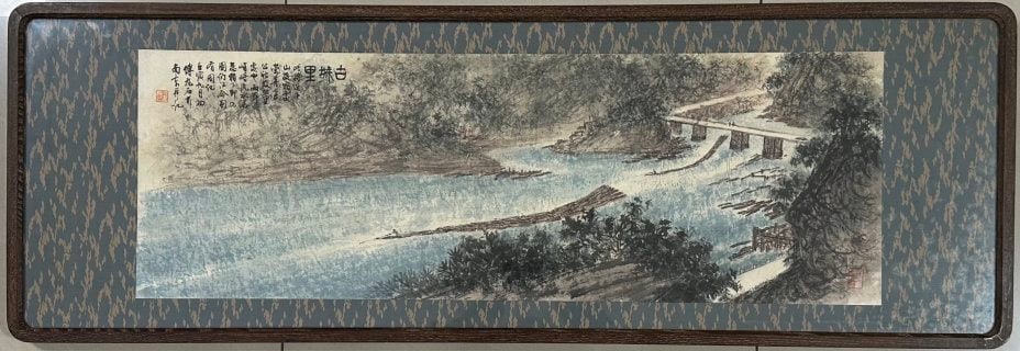 Fu Baoshi Fine Landscape in Frame: A horizontal landscape on paper, colour, in its original frame. It depicts a river with distant mountains, long bridges and woods, with log rafts and boats on the water; the upper left bears the