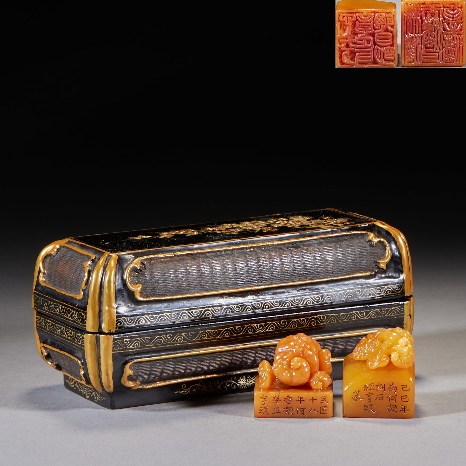He Xiangning Two Tianhuang Stone Seals, 18th Year of the Republic: With original black-lacquered gold-traced old box. The seal sides bear Republic-era date marks; the knops are carved as lingzhi and auspicious beasts; each face is cut in red seal script. Tianhuang