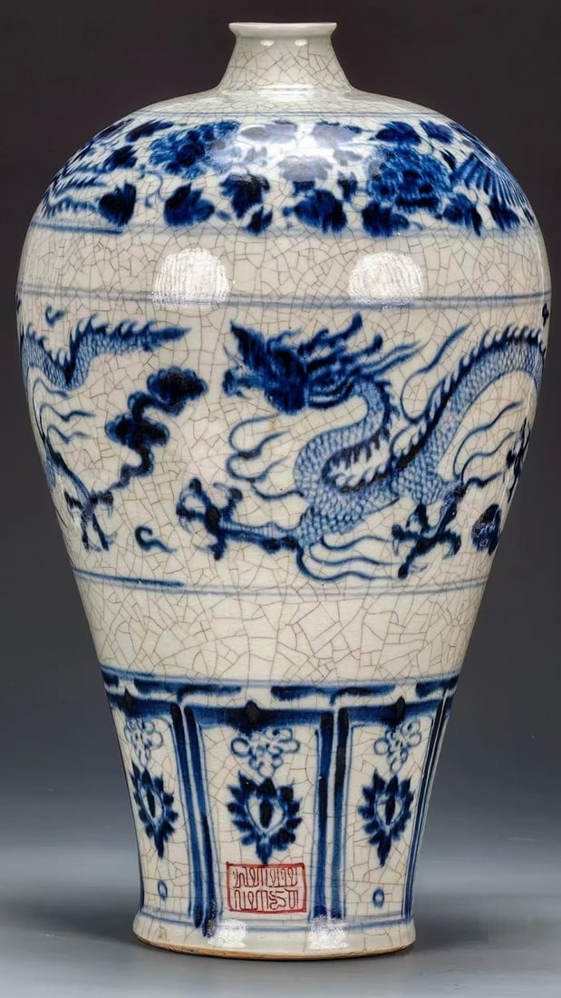 Phags-pa-Script Underglaze-Blue Soaring-Dragon Prunus Vase: On a ge-type crazed glaze the body is painted with underglaze-blue cloud-dragons, with lotus-petal band at the shin and an Arabic-script mark at the base. The combination of ge glaze and
