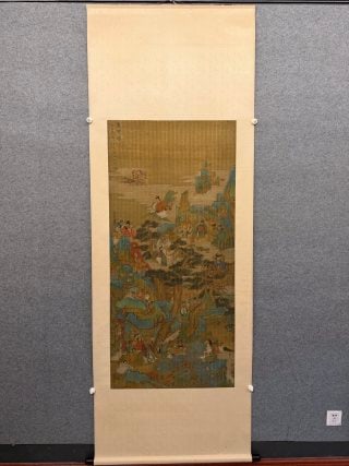 Ding Yunpeng 'Gathering of Immortals', on Silk: Polychrome on silk: celestial mountains with pavilions and a host of immortals in rich blue-green; rocks and trees clearly layered, in original brocade-mount hanging scroll. L 150 cm, W 70 cm.