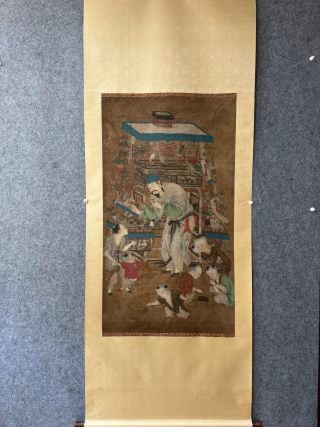 Su Hanchen 'Peddler Scene': A polychrome figure painting on a hanging scroll. It depicts a peddler's stall laden with toys and wares while children play around; the figures are lively and the colouring archaic and rich. The