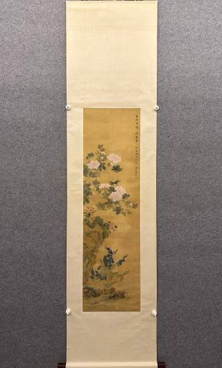 Jiang Tingxi Flowers on Silk: Jiang Tingxi's flowers on silk painted in fine-brush boneless (mogu) style with muted colours, leaves spread and blossoms lovely. Flower-and-bird work by the Qing court painter Jiang Tingxi, fine in