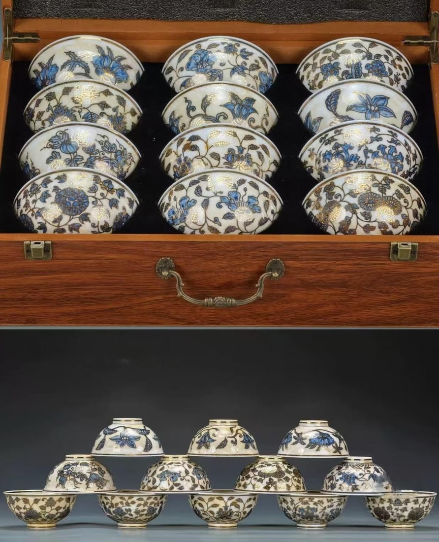Set of Chenghua Underglaze-Blue Gold-Traced Scrolling-Lotus Twelve Zodiac Bowls: A set of twelve bowls painted in underglaze blue with scrolling lotus traced in gold; the blue is soft and the gold bright. The bases bear 'Made in the Chenghua reign of the Great Ming'; preserved