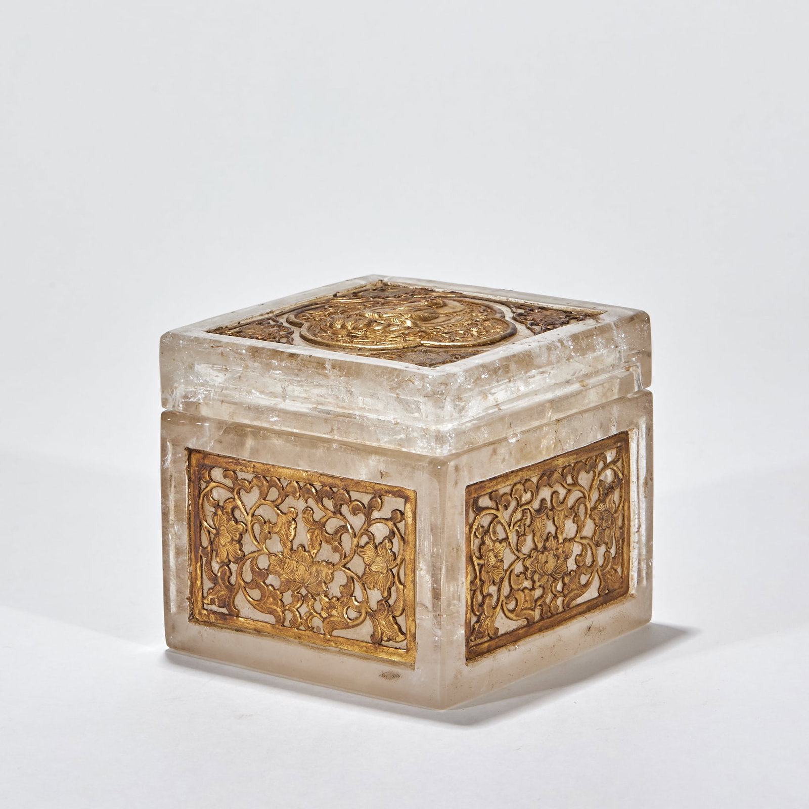 Liao-Dynasty Crystal Inlaid Covered Box: A Liao covered box of crystal as the main material, the body inlaid with other materials as decoration. The crystal is clear and the box delicate ?? a Liao craft, both practical and display. H 9 cm,