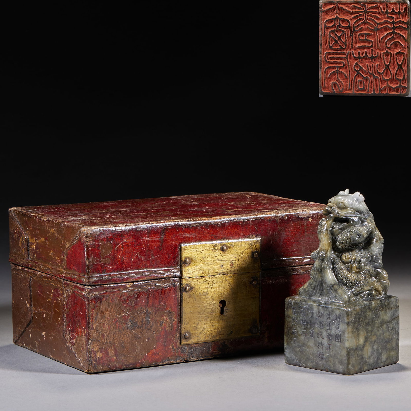 Dragon-Drinking-Water Seal, Given by Hu Hanmin, Cut by Tang Zuishi: A tianhuang or Shoushan seal with a dragon-drinking-water knop; the side records 'Given by Hu Hanmin, cut by Tang Zuishi'. Cut by a famous master ?? of artistic and human value. H 11 cm, L 5 cm, W