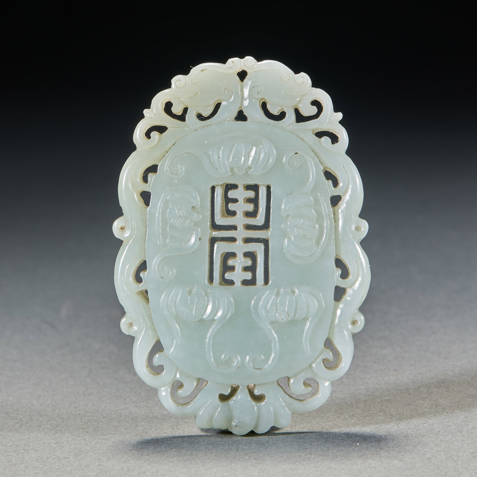 Hetian Jade 'Five Fortunes at the Door' Plaque: A Hetian jade plaque carved in relief with five bats, which pun on 'five fortunes', symbolising the five fortunes arriving at the door. The jade is warm and finely carved, with a hole at the top ?? a