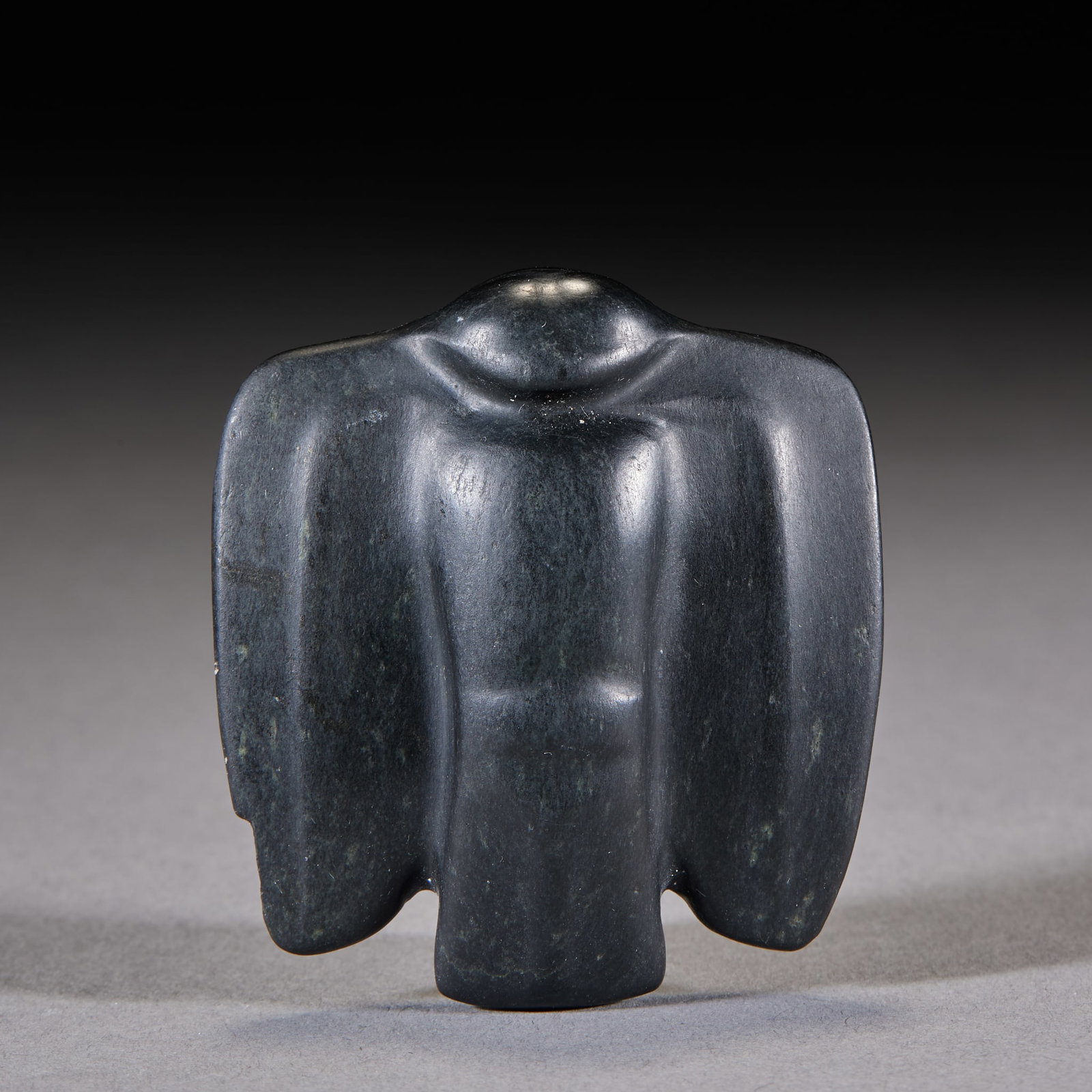 Hongshan Jade Owl: A Hongshan jade owl, plump, round staring eyes, wings folded. Warm calcified jade, archaic form ?? a Hongshan owl symbolising warding off evil. H 1.4 cm, L 5.4 cm, W 5 cm, 59 g.