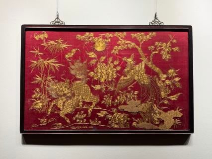 Qing Couched-Gold 'Qilin and Phoenix Auspicious': A Qing couched-gold embroidery of a qilin and a phoenix, symbolising 'qilin and phoenix bring good omen, auspiciousness fills the hall'. Gold thread coiled, brilliant, intricate ?? a treasured Qing