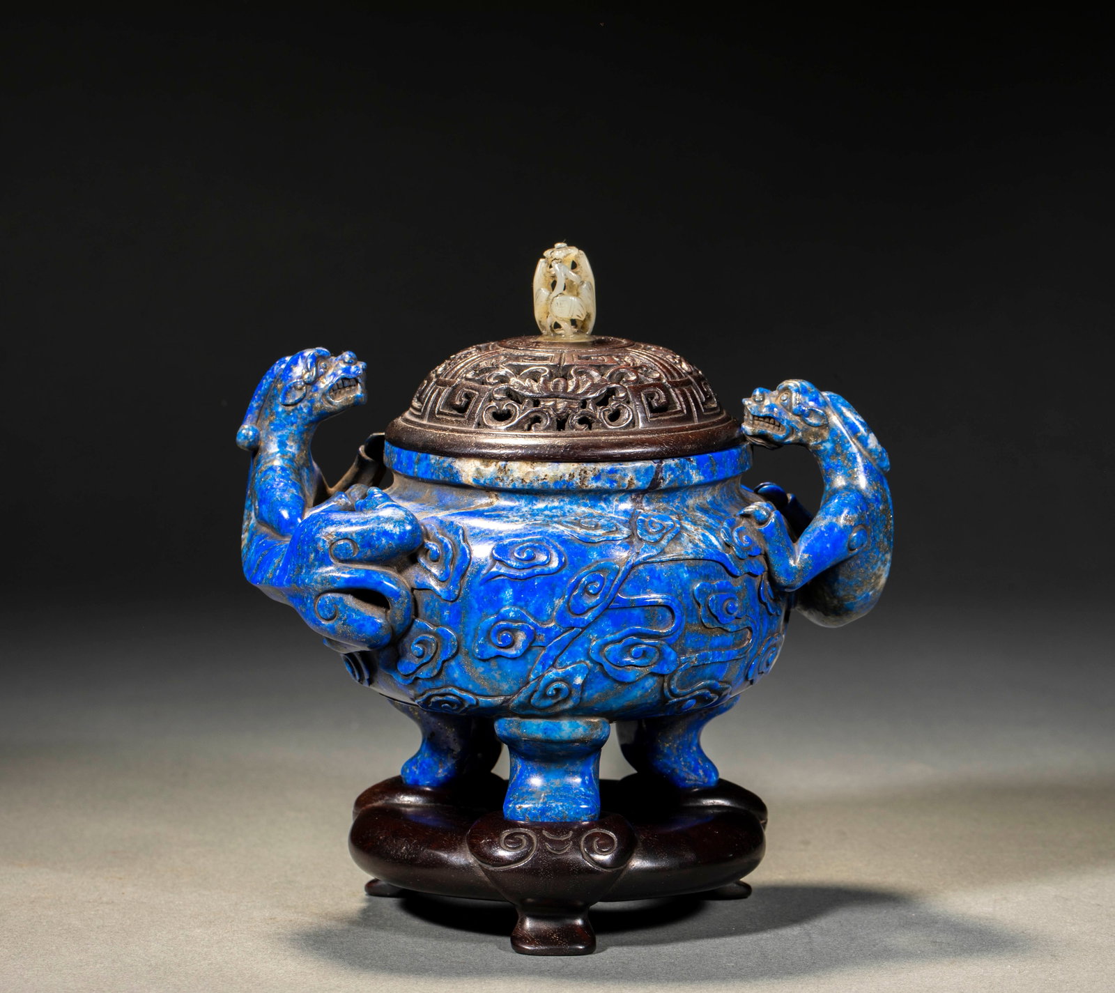 Lapis Lazuli Beast-Ear Incense Burner: A lapis lazuli incense burner with beast ears at the sides, deep blue with golden flecks, on feet. A display incense burner, quiet and noble in tone. H 17 cm, L 15 cm, W 10 cm.