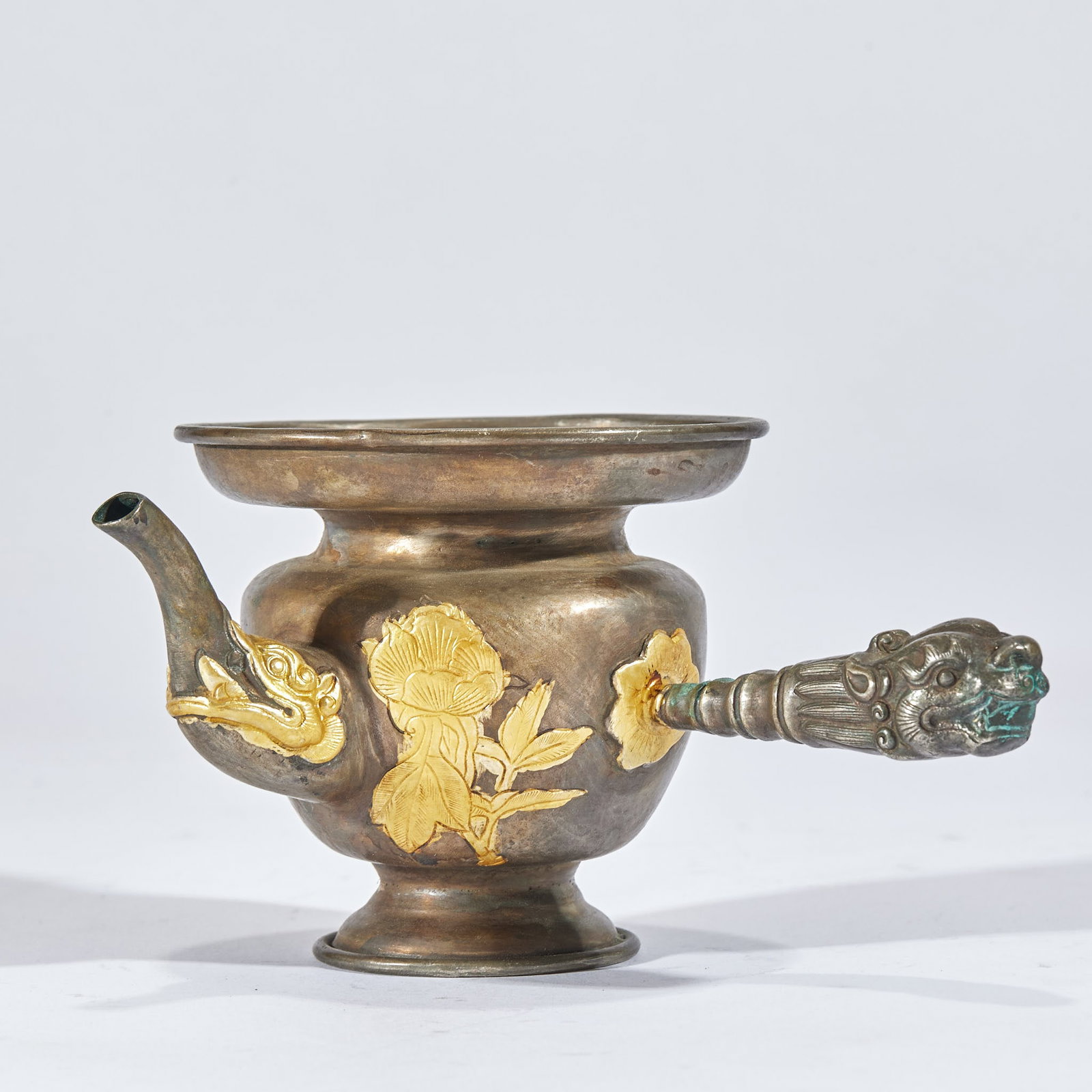 Partially Gilt Copper Dragon Hand-Held Ewer: A partially gilt copper hand-held ewer engraved with dragons and partly gilded, with a handle at the side. Gold and copper alternating, fierce decoration ?? a handling or practical ewer. H 9 cm, L