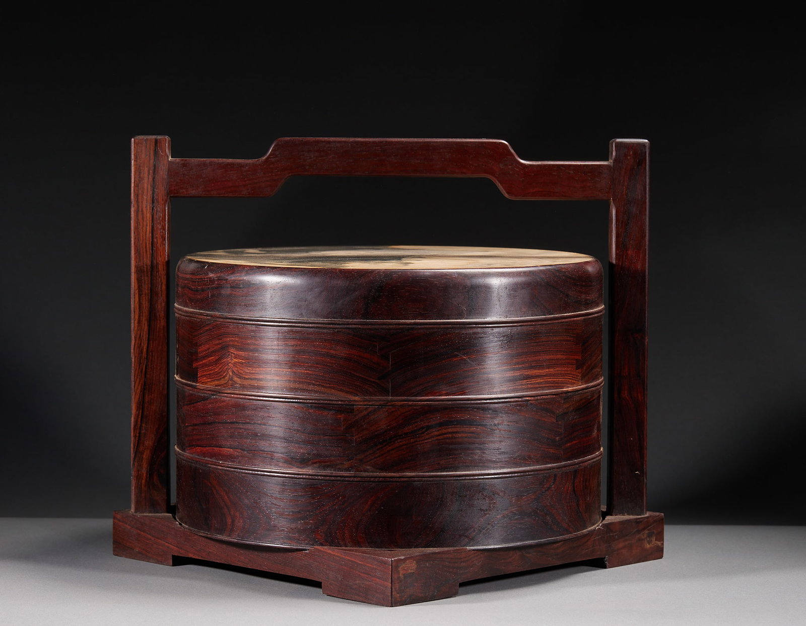 Zitan Food Box: A zitan food box in multiple tiers, plain or lightly carved. Oily wood with warm patina ?? a vessel for food, delicate and practical. H 28 cm, L 34 cm, W 36 cm.