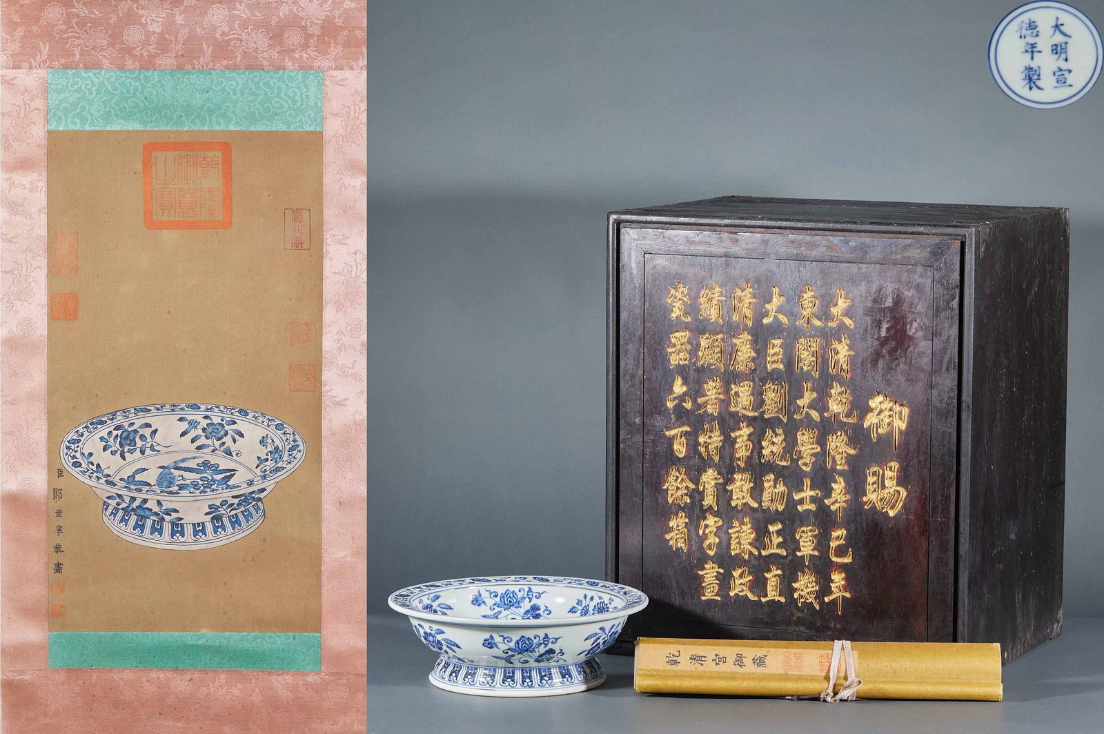 Xuande Underglaze-Blue Flower-and-Bird Offering Dish: A Xuande underglaze-blue flower-and-bird offering dish painted with lively flowers and birds, rich blue. An offering or display dish, the base possibly bearing the mark 'Made in the Xuande reign of